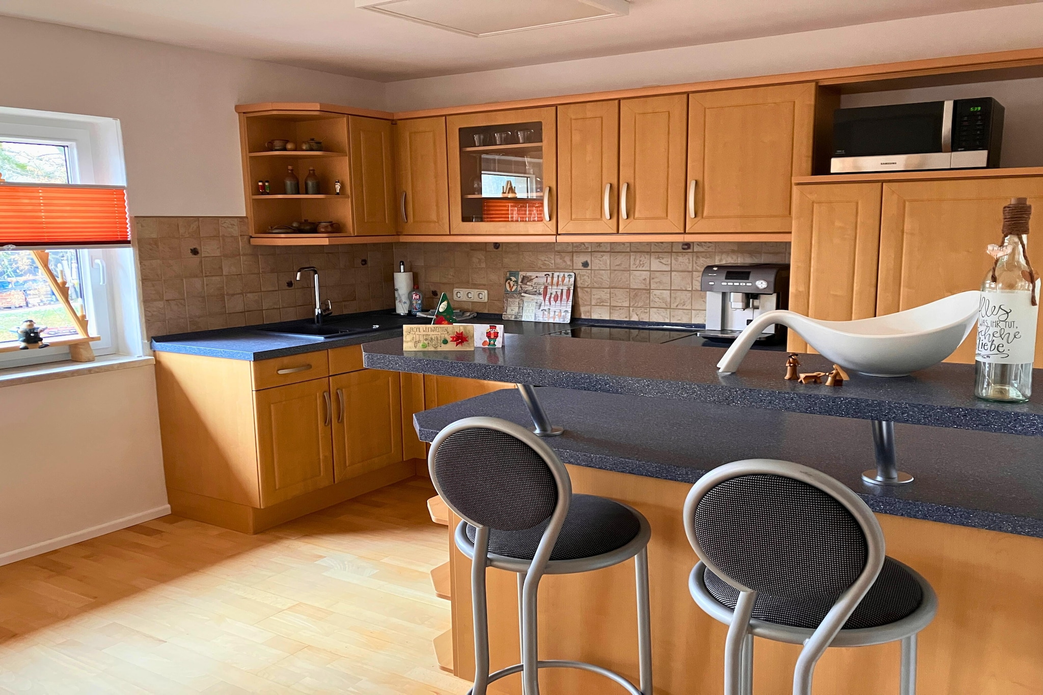 On the 1st floor: (Living room(double sofa bed, TV, fireplace), open kitchen(dining table, electric kettle, toaster, cooker, coffee machine, oven, microwave, dishwasher, fridge), bedroom(single trundle bed, single trundle bed, double bed or 2 single beds, TV), sleeping niche(single bed), bathroom(bath tub, shower, washbasin, toilet, hairdryer), balcony)\n\nParking, cot, terrace, garden, garden furniture, BBQ, trampoline, changing mat, high chair, Swing set