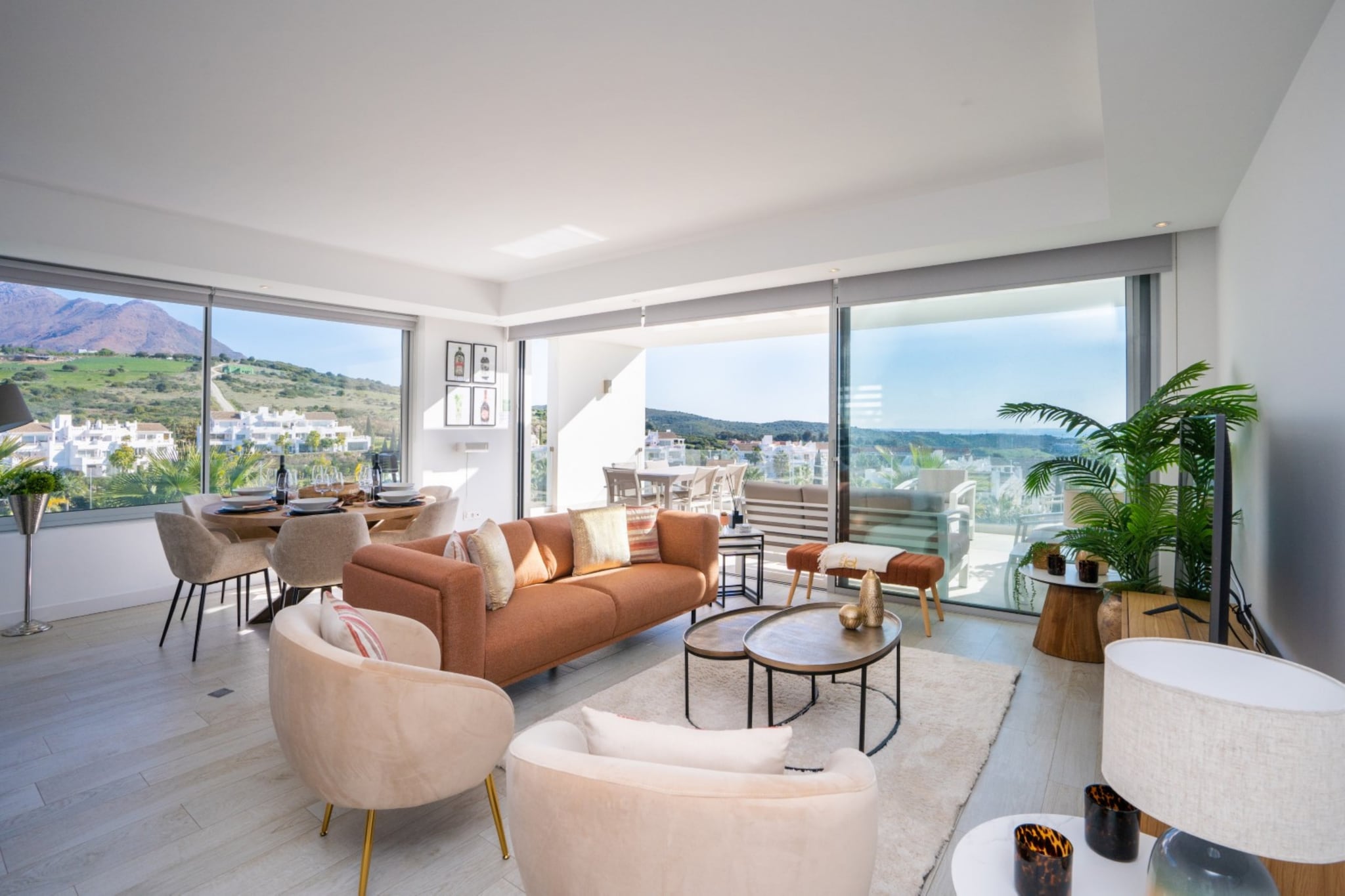 Dreaming of a relaxed Mediterranean escape in this stylish apartment set within the exclusive Alcazaba Lagoon resort in Casares near Estepona. Surrounded by tropical gardens and contemporary architecture, it offers a peaceful base for families or friends exploring the Costa del Sol.

Inside, the apartment accommodates up to six guests across three bedrooms. The sleeping layout includes two bedrooms with king-size beds and one bedroom with two single beds. The bright living and dining area features comfortable seating, a Smart TV and a dining table for shared meals. A well-equipped kitchen allows convenient meal preparation, while air conditioning and high-speed WiFi ensure comfort throughout the stay.

Step outside onto the spacious private terrace furnished with outdoor seating, perfect for enjoying warm Mediterranean evenings. Guests also benefit from access to the resort’s impressive facilities, including the Crystal Lagoon with its private sandy beach, communal swimming pools, landscaped gardens, a gym and water activities such as kayaking and paddleboarding.

The apartment is located a short walk from the lagoon and resort restaurant. Nearby, the beaches and charming old town of Estepona are about 4 km away, while several golf courses, including Estepona Golf and Duquesa Golf, are within easy reach for guests looking to enjoy the Costa del Sol lifestyle.
