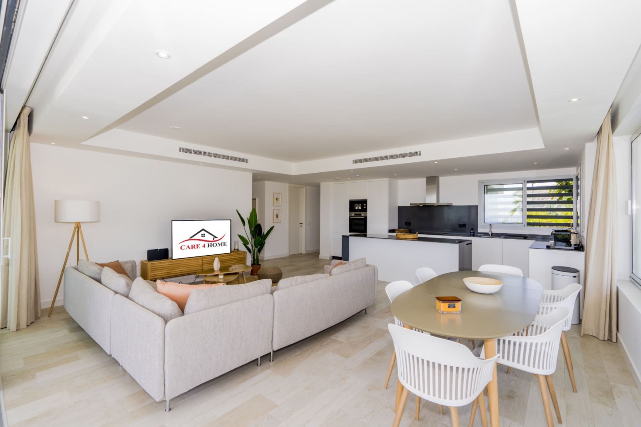 Experience relaxed resort living in this stylish apartment set within the sought-after Alcazaba Lagoon community in Casares near Estepona. Surrounded by landscaped gardens and contemporary white architecture, the residence offers a peaceful Costa del Sol base for families or friends looking to combine comfort with resort amenities.

Inside, the apartment accommodates up to six guests across three bedrooms. The sleeping layout includes two bedrooms with double beds and a third bedroom with two single beds. The bright living and dining area features comfortable seating, a TV, a radio and a dining table for shared meals. A well-equipped kitchen supports everyday cooking, while air conditioning, heating, internet access and elevator access add convenience throughout the stay. Two modern bathrooms with showers, washbasins and toilets provide practical comfort for guests.

Step outside to enjoy the balcony and terrace with outdoor seating, ideal for relaxing mornings or warm Mediterranean evenings. Guests also benefit from access to shared resort facilities including a swimming pool, children's pool, garden areas and wellness amenities such as a fitness room, sauna and hot tub. Parking is available at the property, and a washing machine adds extra convenience for longer stays.

The apartment sits within the renowned Alcazaba Lagoon resort, known for its turquoise lagoon, sandy beach areas and relaxed atmosphere. Estepona's beaches, marina and charming old town are a short drive away, offering restaurants, boutiques and seaside promenades along the Costa del Sol.