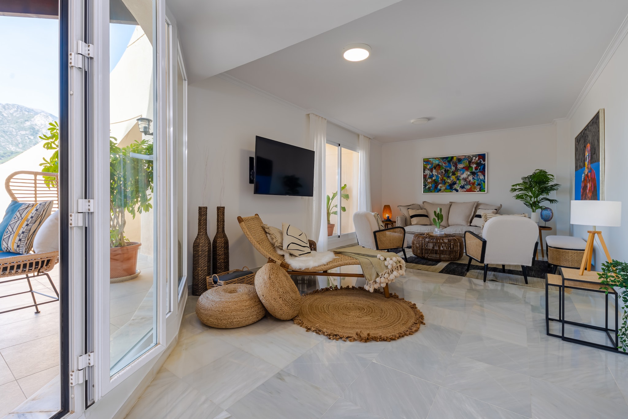 Right in the heart of Marbella, this stylish penthouse offers an inviting base for guests who want to experience the energy of the city while enjoying private outdoor space and resort-style comforts. With restaurants, boutiques and the famous Marbella promenade nearby, it is ideal for families or friends looking to explore the Costa del Sol.

Inside, the apartment accommodates up to six guests across three bedrooms, each furnished with a king-size double bed. The bright living and dining area features comfortable seating, a TV and a dining table for shared meals. A well-equipped kitchen allows convenient meal preparation during your stay. The property includes two modern bathrooms with showers and toilets, while air conditioning, heating, internet access, elevator access and a washing machine add everyday convenience.

Step outside to the spacious private terrace where garden furniture, sun loungers and a barbecue create a relaxing outdoor setting. A paid bubble bath jacuzzi adds an extra touch of indulgence, perfect for unwinding after a day exploring Marbella. Guests also benefit from access to the residence's shared swimming pool and on-site parking.

The penthouse sits in Marbella's vibrant city centre close to beaches, beach clubs and the lively promenade. Nearby, you will find restaurants, cafés and shops, while Puerto Banus and several golf courses are a short drive away, offering plenty of ways to enjoy the Costa del Sol lifestyle.