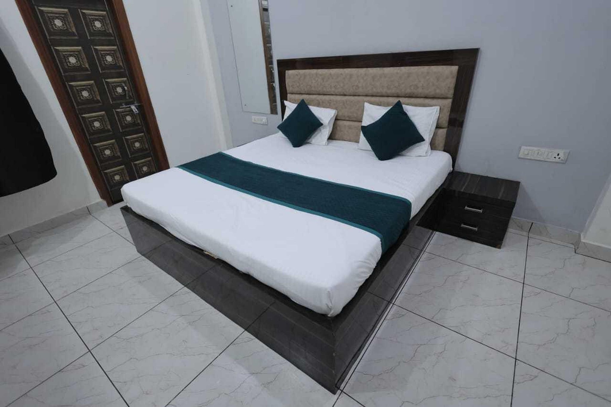 Enjoy a comfortable and hassle-free experience at our thoughtfully designed property. Each room is equipped with modern amenities, cozy bedding, and elegant decor to make you feel right at home. Located conveniently with easy access to public transport and major attractions, it's perfect for both business and leisure travelers. Cleanliness and guest comfort are our top priorities, and our team is available 24/7 to assist you throughout your stay.
Unmarried couples are warmly welcome at this property.
Guests with local ID proof are warmly welcome.
Foreign guests are welcome and allowed to stay at this property without any restrictions
Early Check-In Policy: A full day’s room rate will be charged for check-ins before 6:00 AM. Complimentary early check-in is available between 6:00 AM and 10:00 AM, subject to room availability.
Check-in is only available to guests aged 18 and above. Please provide a government-issued ID to confirm your age.