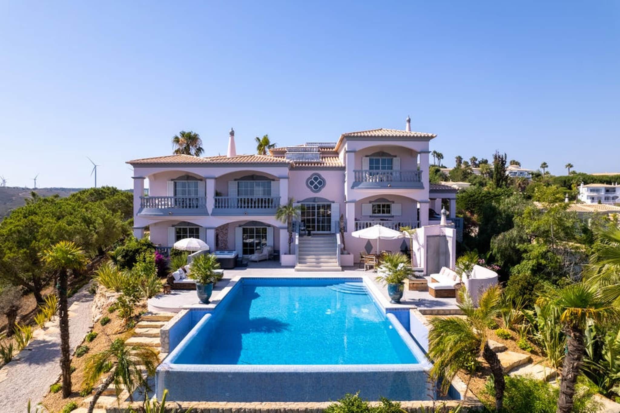 This elegant retreat in Budens offers a refined and peaceful Algarve escape, specifically designed for those who value privacy and the beauty of outdoor living. This accommodation consists of a single, independent private double bedroom with its own ensuite bathroom. Please note that this is a private room rental; no indoor kitchen or living room facilities are included within the guest suite.

While the interior is dedicated to rest, the sprawling exterior areas are yours to enjoy. Guests have full access to the swimming pool, the sun-drenched pool terrace, and the lush gardens. For your culinary needs, you are invited to use the outdoor BBQ and exterior kitchen area, which features a comfortable seating space perfect for alfresco dining under the stars. Please be aware that a microwave is not available on-site.

Located within the tranquil Santo António Golf Resort, you are perfectly positioned to explore the best of the region. A supermarket is conveniently located in Budens for your supplies, and the golden sands of Salema Beach are just 4.6 km away. Whether you are spending your days on the golf course or taking the short 19 km drive to the historic streets of Lagos, this sophisticated suite provides a quiet, high-quality base for a serene getaway.