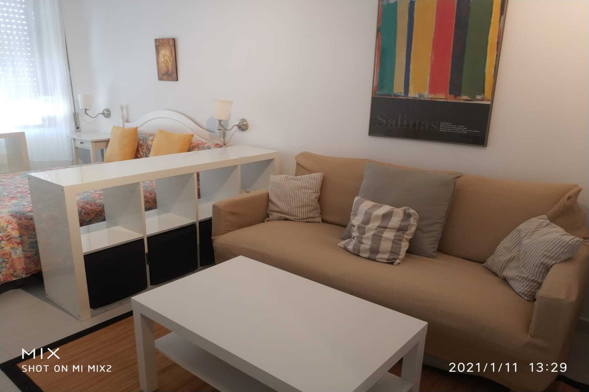 Tucked away in the vibrant Triana district of Seville, this charming apartment is a perfect retreat for two guests looking to experience the city’s authentic atmosphere. Just across the river from the historic centre, it places you within easy reach of Seville’s most famous landmarks while offering a relaxed neighbourhood setting filled with local character. Spend your days wandering through lively streets, enjoying tapas by the river, or discovering hidden corners of the city before returning to your cozy home base.

Inside, the apartment offers a bright and welcoming space designed for comfort and simplicity. The living area features a comfortable seating space with a TV and dining table where you can unwind or plan the next day’s adventures. The open kitchen is equipped with essentials, including a cooker and fridge, making it easy to prepare light meals or breakfast before heading out. A comfortable bedroom with a double bed and private bathroom with shower, washbasin, and toilet ensures a restful stay, while air conditioning keeps the space cool during Seville’s warm days.

Step outside, and the magic of Seville is right at your doorstep. The apartment is just a pleasant walk from iconic sights such as the Cathedral, the Giralda, and Plaza de España, while the lively Feria de Abril grounds are only minutes away. Surrounded by traditional tapas bars, charming cafés, and vibrant streets, this apartment offers the perfect starting point for exploring the culture, flavours, and unforgettable charm of Seville.