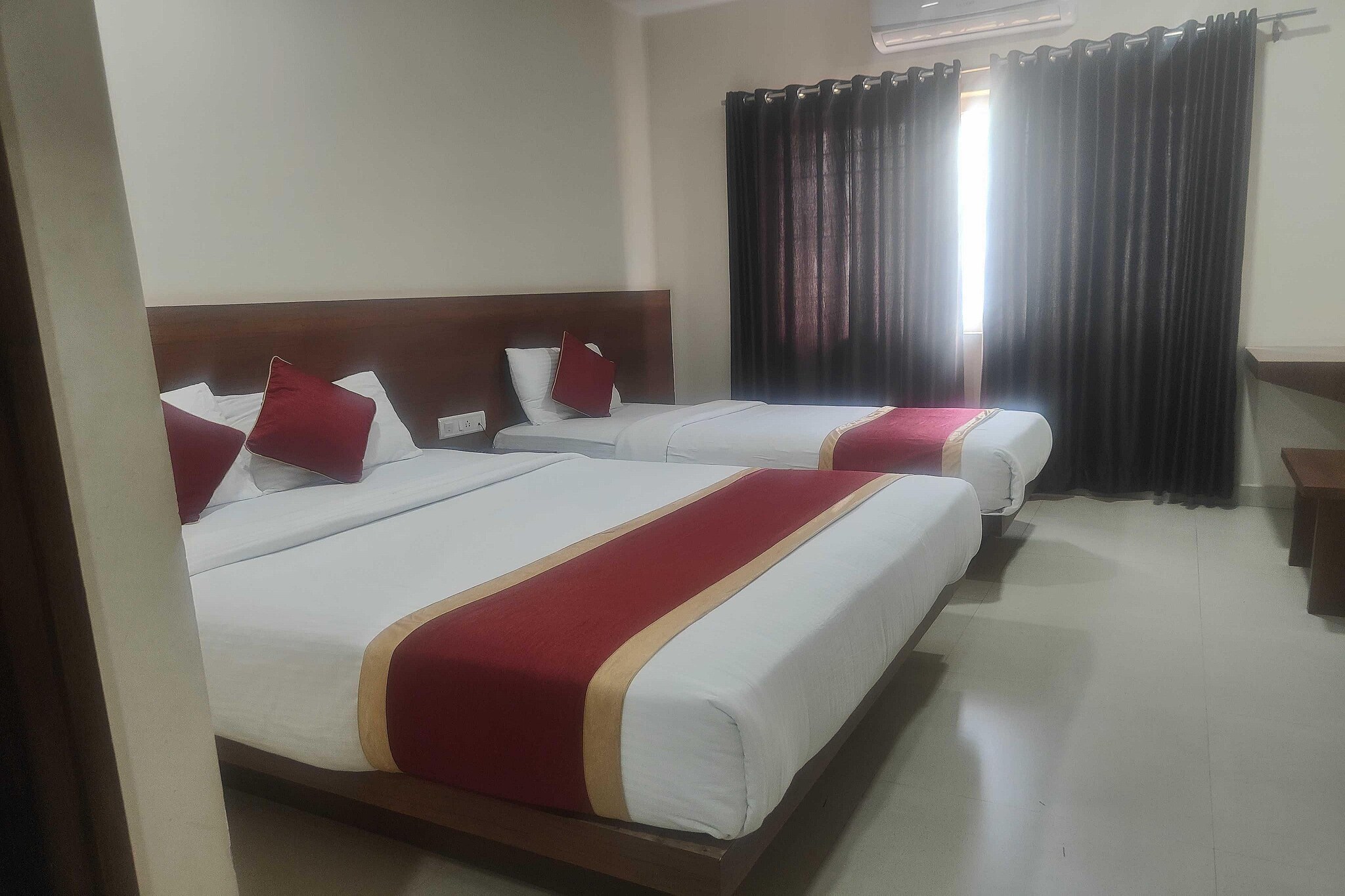 Enjoy a comfortable and hassle-free experience at our thoughtfully designed property. Each room is equipped with modern amenities, cozy bedding, and elegant decor to make you feel right at home. Located conveniently with easy access to public transport and major attractions, it's perfect for both business and leisure travelers. Cleanliness and guest comfort are our top priorities, and our team is available 24/7 to assist you throughout your stay.
 
Unmarried couples are warmly welcome at this property.
Guests with local ID proof are warmly welcome.
Foreign guests are welcome and allowed to stay at this property without any restrictions
Early Check-In Policy: A full day’s room rate will be charged for check-ins before 6:00 AM. Complimentary early check-in is available between 6:00 AM and 10:00 AM, subject to room availability.
 
Check-in is only available to guests aged 18 and above. Please provide a government-issued ID to confirm your age.