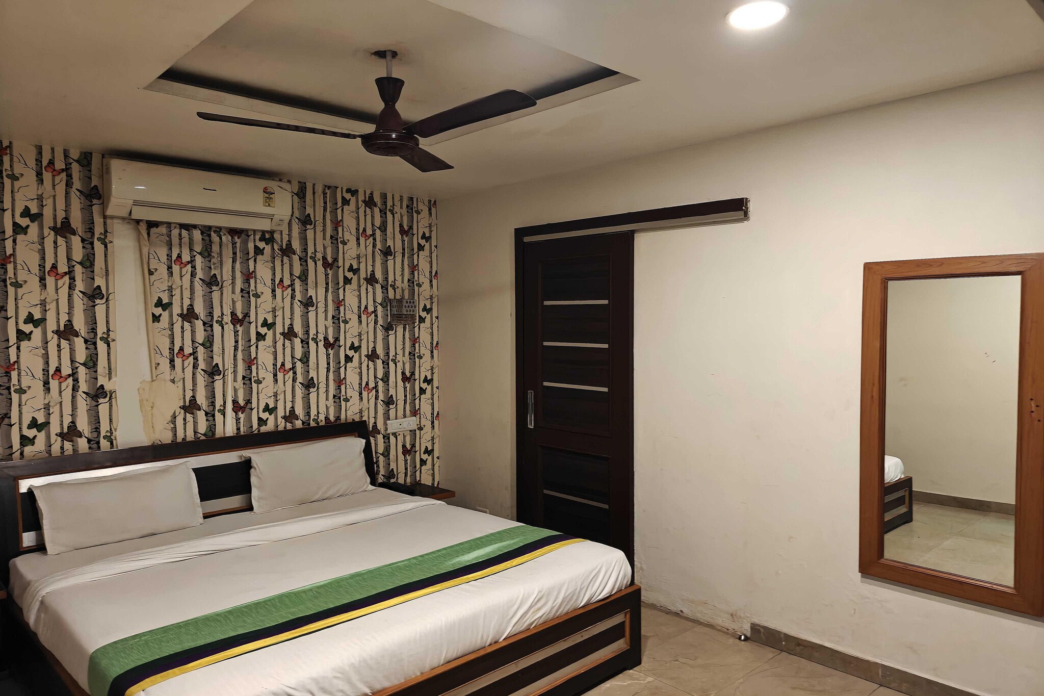Enjoy a comfortable and hassle-free experience at our thoughtfully designed property. Each room is equipped with modern amenities, cozy bedding, and elegant decor to make you feel right at home. Located conveniently with easy access to public transport and major attractions, it's perfect for both business and leisure travelers. Cleanliness and guest comfort are our top priorities, and our team is available 24/7 to assist you throughout your stay.
 
Unmarried couples are warmly welcome at this property.
Guests with local ID proof are warmly welcome.
Foreign guests are welcome and allowed to stay at this property without any restrictions
Early Check-In Policy: A full day’s room rate will be charged for check-ins before 6:00 AM. Complimentary early check-in is available between 6:00 AM and 10:00 AM, subject to room availability.
 
Check-in is only available to guests aged 18 and above. Please provide a government-issued ID to confirm your age.