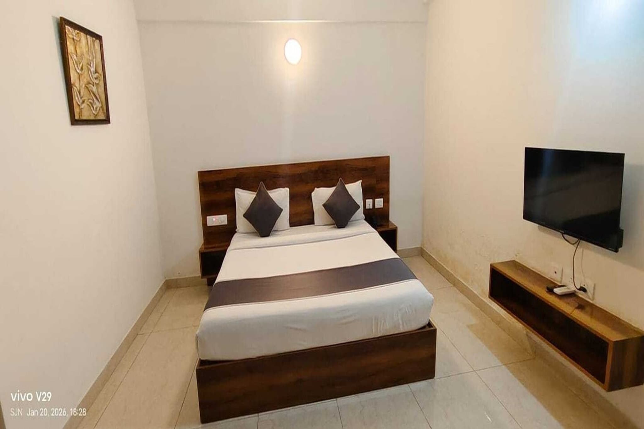 Comfortable Accommodations: Hotel O Bangalore in Hassan offers family rooms with air-conditioning, private bathrooms, work desks, and seating areas. Each room includes free toiletries, bath or shower, TV, tiled floors, and a wardrobe. Essential Facilities: Guests enjoy free WiFi, a 24-hour front desk, daily housekeeping service, room service, and luggage storage. The hotel provides a welcoming environment with English and Hindi spoken at reception. Local Attractions: Located 30 km from Indian Institute of Science and Bangalore City Railway Station, 35 km from Bangalore Palace and Cubbon Park, and 40 km from Kempegowda International Airport. Nearby attractions include Yeswanthpur Railway Station and Indira Gandhi Musical Fountain Park. 

Unmarried couples are warmly welcome at this property.
Guests with local ID proof are warmly welcome.
Foreign guests are welcome and allowed to stay at this property without any restrictions
Early Check-In Policy: A full day’s room rate will be charged for check-ins before 6:00 AM. Complimentary early check-in is available between 6:00 AM and 10:00 AM, subject to room availability.
 
Check-in is only available to guests aged 18 and above. Please provide a government-issued ID to confirm your age.