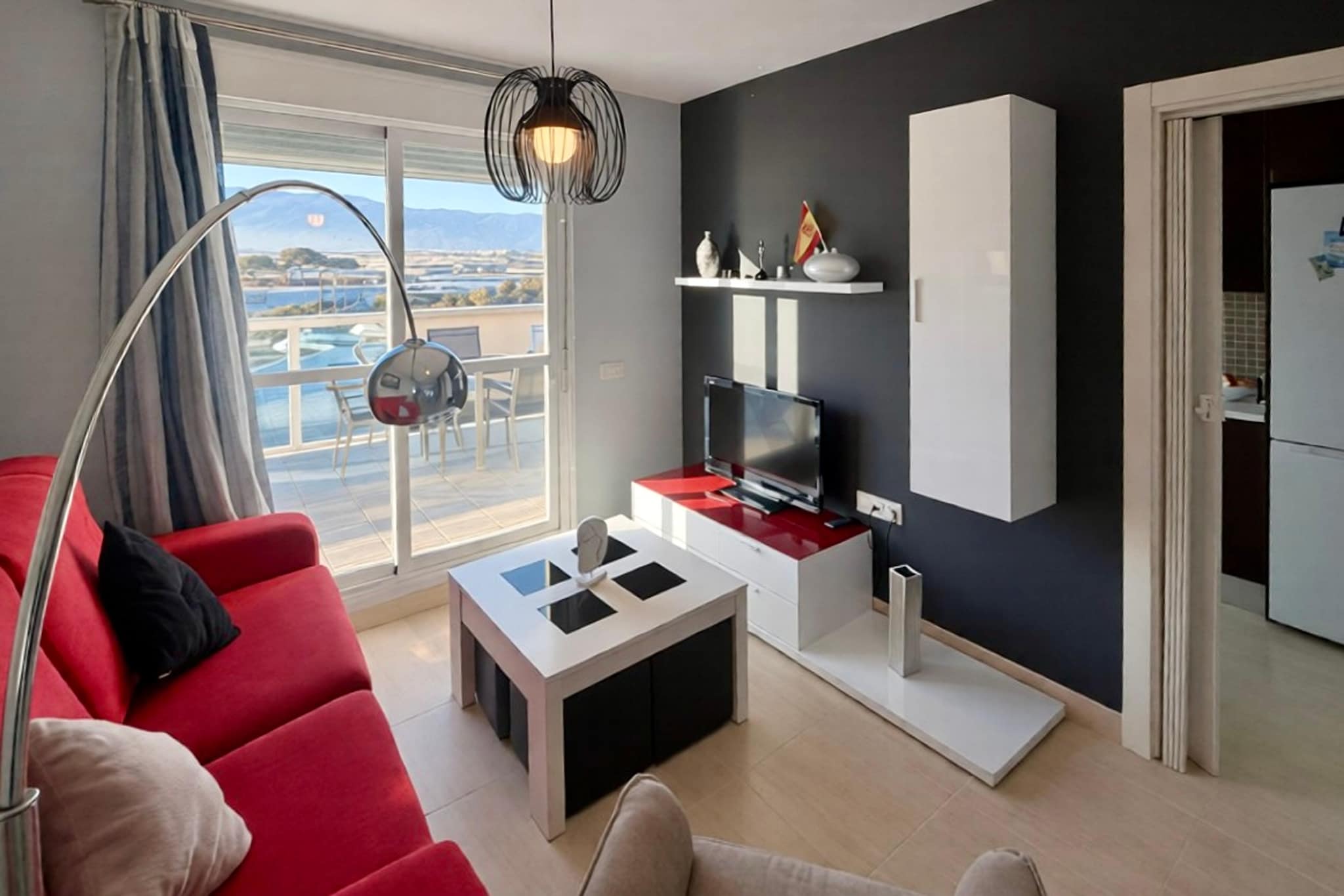 Wake up to the sound of gentle waves and the scent of the sea breeze in this charming studio apartment in Roquetas de Mar, perfectly located right in front of the beach. Designed for comfort and simplicity, this cozy retreat is ideal for couples, friends, or small families looking to unwind and reconnect. Spend your mornings strolling along the golden sands, take a dip in the shared pool, or relax in the lush community garden while a delicious barbecue sizzles nearby.

Step outside, and the lively atmosphere of Roquetas de Mar awaits. Within walking distance, you’ll find a variety of restaurants, cafés, and beach bars where you can indulge in authentic Andalusian flavors. For a touch of history, visit the nearby Santa Ana Castle, just 3.5 km away, or spend an afternoon on the golf course, enjoying a round under the warm Spanish sun. Every corner of this seaside town offers something special from scenic promenades to charming local markets.

Back at the studio, unwind in the inviting living space after a day of adventure. The well-equipped kitchen makes it easy to prepare home-cooked meals, and the comfortable sleeping area ensures a peaceful night’s rest. Whether you’re lounging by the pool, savoring tapas by the sea, or simply watching the sunset from your window, this beachside haven captures the true spirit of Mediterranean living relaxed, warm, and wonderfully refreshing.
