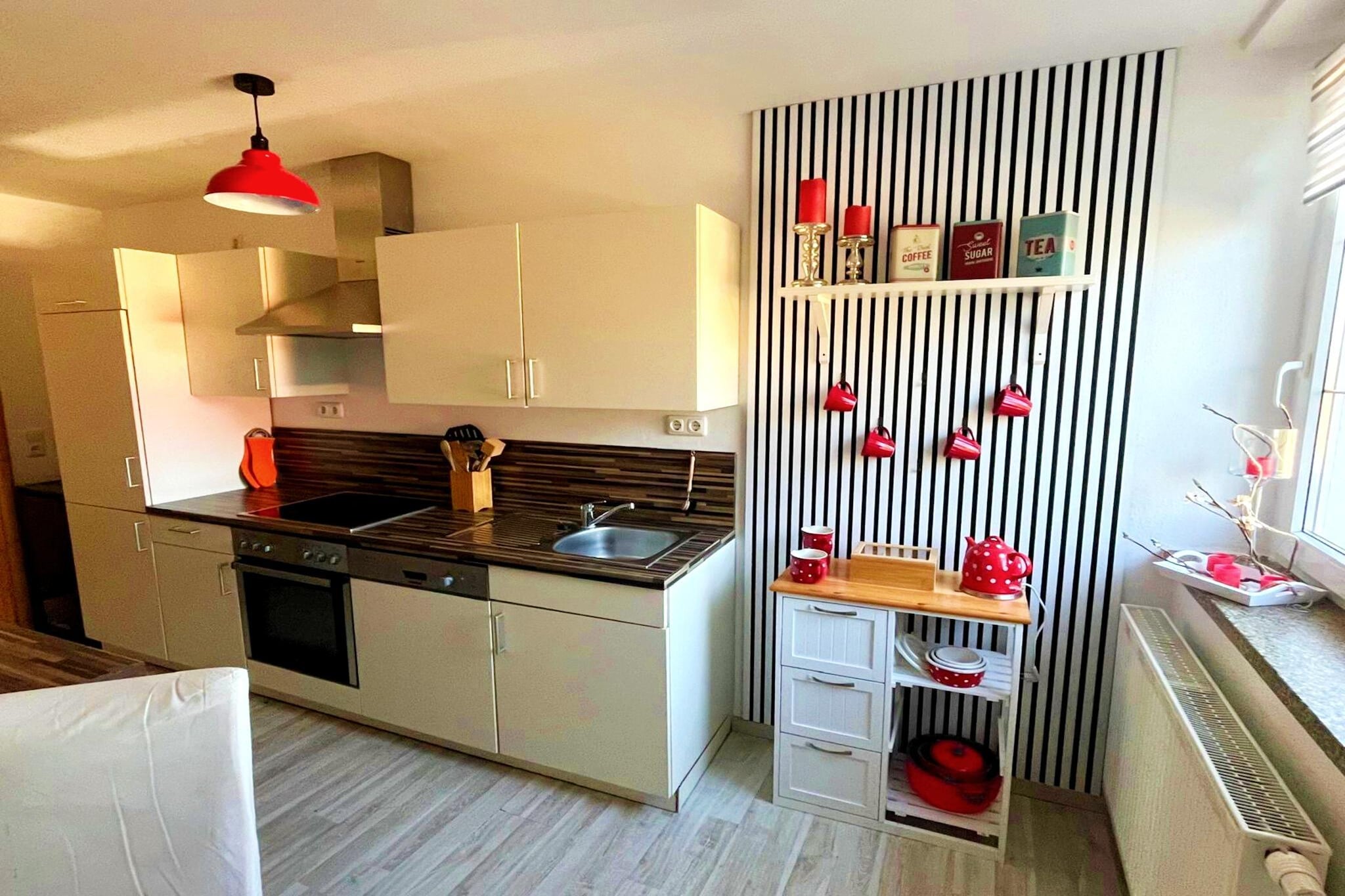 The apartment in Seelitz has 1 bedrooms and capacity for 4 persons. Accommodation of 70 m² cozy and is fully-equiped. The property is located 5 m lake "Sandgrube Biesern", 5 m supermarket "Edeka Bellmann", 26 m golf course "Golfbase Chemnitz", 2 km river "Aubach", 4 km river "Crossener Bach", 4 km the restaurant "Gaststätte Faßmanns", 5 km river "Erlbach", 5 km supermarket "PENNY", 5 km the restaurant "La Bonta", 6 km train station "Bahnhof Steudten", 6 km coffee shop "Bäckerei Stölzel", 7 km train station "Bahnhof Geringswalde", 8 km bus station "Schweikershain", 10 km park "Schlosspark Wechselburg", 12 km hospital "Landkreis Mittweida Krankenhaus gGmbH - Klinikum Mittweida", 16 km water park "Sportzentrum am Taurastein", 19 km amusement park / theme park "Sonnenlandpark Lichtenau", 20 km nature reserve "Naturpark Köbe", 22 km water park "Freizeitbad Riff", 22 km thermal springs "Freizeitbad RIFF", 25 km water park "Freizeit & Familienbad Limbomar", 26 km nature reserve "Klosterholzer Wald", 27 km airport "Flughafen Göpfersdorf", 70 km international airport "Flughafen Leipzig/Halle" and it is located in a a quiet zone and in a beautiful rural area. The accommodation is equipped with the following items: barbecue, fireplace, internet (Wi-Fi), hair dryer, balcony, sauna, central heating, open-air parking in the same building, 1 TV, satellite tv. The independent kitchen, electric, is equipped with refrigerator, oven, freezer, dishwasher, dishes/cutlery, kitchen utensils, coffee machine and kettle.