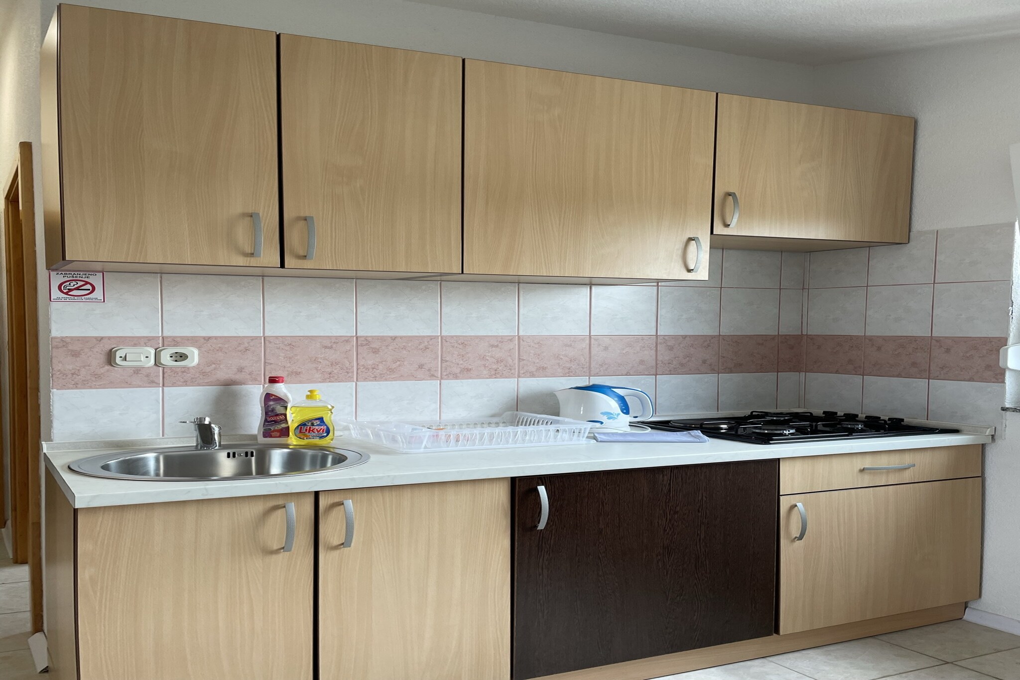 The apartment in Vir has 1 bedrooms and capacity for 4 persons. Accommodation of 40 m² charming and is fully-equiped, located on beach, It has waterfront and garden. The property is located 130 m rock beach, 350 m the restaurant, 350 m coffee shop, 850 m supermarket, 9 km city, 25 km hospital, 36 km international airport, 36 km airport and it is located in a a family-friendly zone and next to the sea. The accommodation is equipped with the following items: garden, outdoor furniture, fenced plot, terrace, barbecue, internet (Wi-Fi), hair dryer, electric heating, air-conditioned, open-air parking in the same building, TV, satellite tv. The open plan kitchen, electric, is equipped with refrigerator, microwave, freezer, dishes/cutlery, kitchen utensils, coffee machine, toaster and kettle.