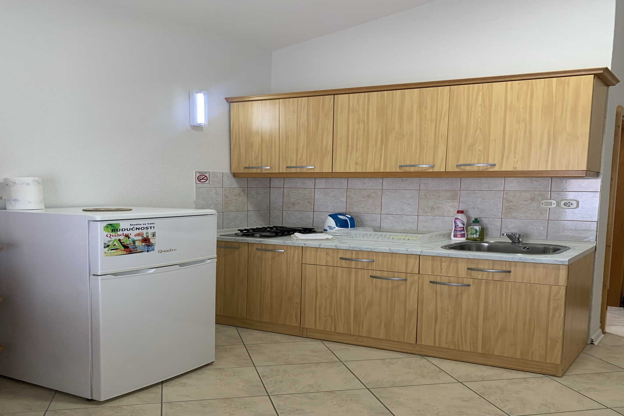 The apartment in Vir has 1 bedrooms and capacity for 4 persons. Accommodation of 40 m² charming and is fully-equiped, located on beach, It has waterfront and garden. The property is located 130 m rock beach, 350 m the restaurant, 350 m coffee shop, 850 m supermarket, 9 km city, 25 km hospital, 36 km international airport, 36 km airport and it is located in a a family-friendly zone and next to the sea. The accommodation is equipped with the following items: garden, outdoor furniture, fenced plot, terrace, barbecue, internet (Wi-Fi), hair dryer, electric heating, air-conditioned, open-air parking in the same building, TV, satellite tv. The open plan kitchen, electric, is equipped with refrigerator, microwave, freezer, dishes/cutlery, kitchen utensils, coffee machine, toaster and kettle.