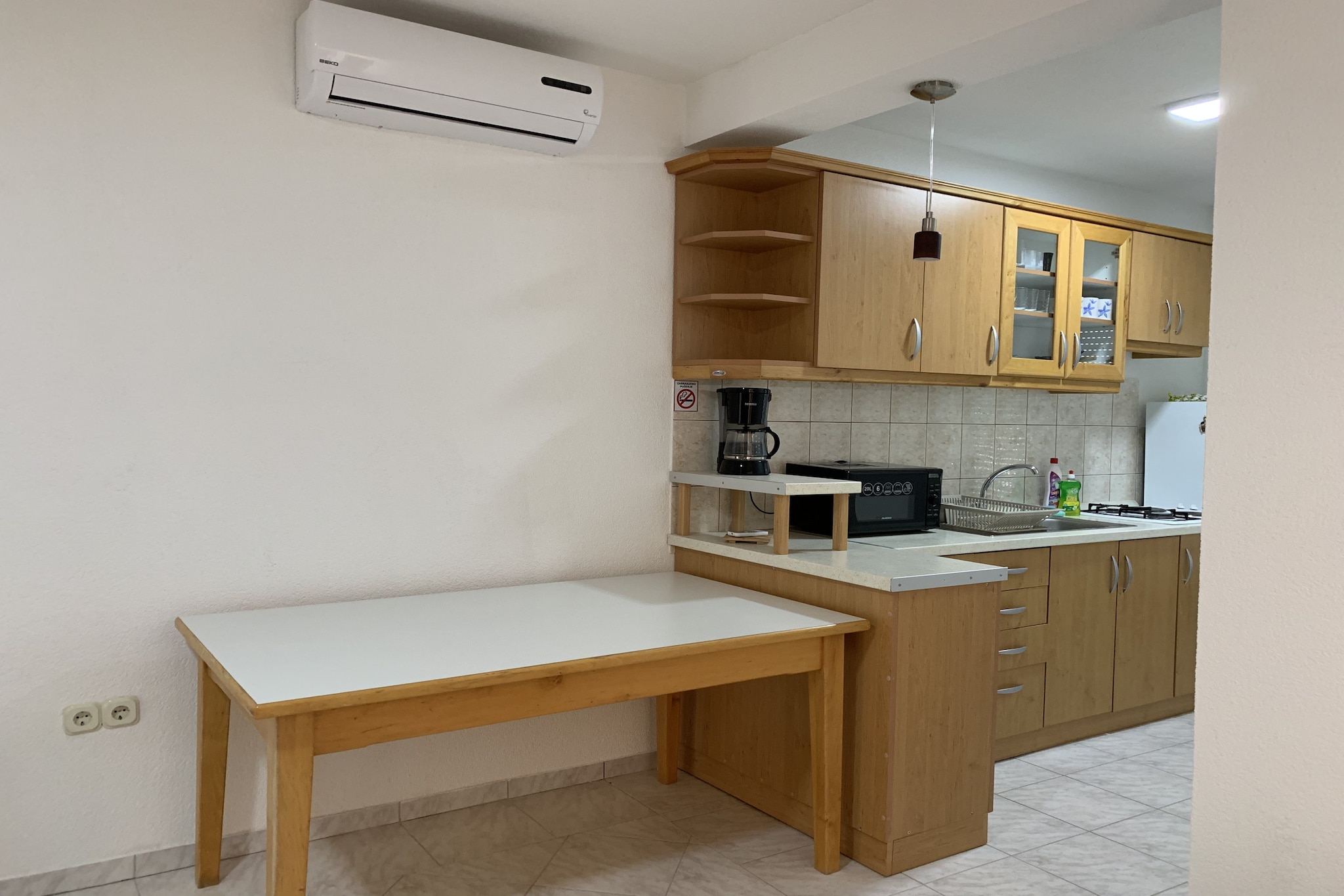 The apartment in Vir has 2 bedrooms and capacity for 6 persons. Accommodation of 65 m² charming and is fully-equiped, located on beach, It has waterfront. The property is located 130 m rock beach, 350 m the restaurant, 350 m coffee shop, 850 m supermarket, 9 km city, 25 km hospital, 36 km international airport, 36 km airport and it is located in a a family-friendly zone and next to the sea. The accommodation is equipped with the following items: garden, fenced plot, terrace, barbecue, internet (Wi-Fi), hair dryer, electric heating, air-conditioned, open-air parking in the same building, TV, satellite tv. The open plan kitchen, electric, is equipped with refrigerator, microwave, freezer, dishes/cutlery, kitchen utensils, coffee machine, toaster and kettle.