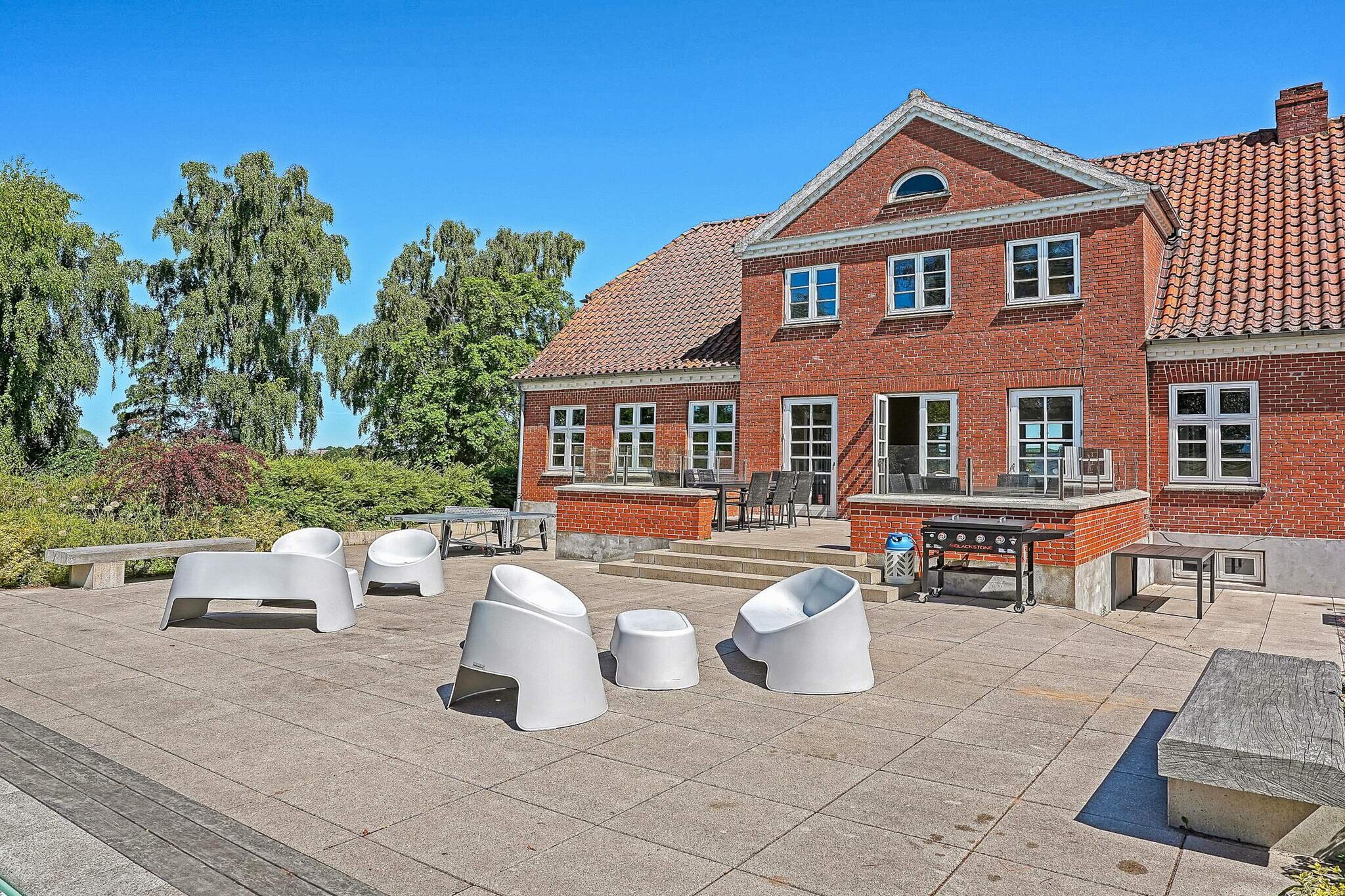 Annex: (double bed)\n\nAnnex: (double bed)\n\nAnnex: (double bed)\n\nAnnex: (double bed)\n\nInternet Access DSL, Kitchen(stove(induction), coffee machine, fridge-freezer), Kitchen(stove(induction), coffee machine, microwave, dishwasher, fridge, fridge-freezer), Kitchen(stove(induction), coffee machine, dishwasher, fridge, freezer(100-139L)), Living/bed room(TV(german television channels, danish TV channels (DR1 and TV2), norvegian TV channels , swedish TV channels)), Living/bed room(TV(german television channels, danish TV channels (DR1 and TV2), norvegian TV channels , swedish TV channels)), Living/bed room, Living/bed room, bedroom(double bed), bedroom(double bed), bedroom(double bed), bedroom(double bed), bedroom(double bed), bedroom(double bed), bedroom(double bed), bedroom(single bed, double bed), bedroom(single bed, double bed), bedroom(double bed), bedroom(double bed), bedroom(double bed), bathroom(washbasin, shower, toilet), bathroom(washbasin, shower, toilet), bathroom(washbasin, shower, toilet), bathroom(washbasin, shower, toilet), bathroom(washbasin, shower, toilet), bathroom(toilet), bathroom(toilet), bathroom(washbasin, shower, toilet), game computer, sauna(shared with other guests, outside, 15 persons), terrace, garden furniture, deckchairs, swimming pool(shared with other guests, outside), play equipment, table tennis table, table football, darts, football goal, billiards, fitness equipment