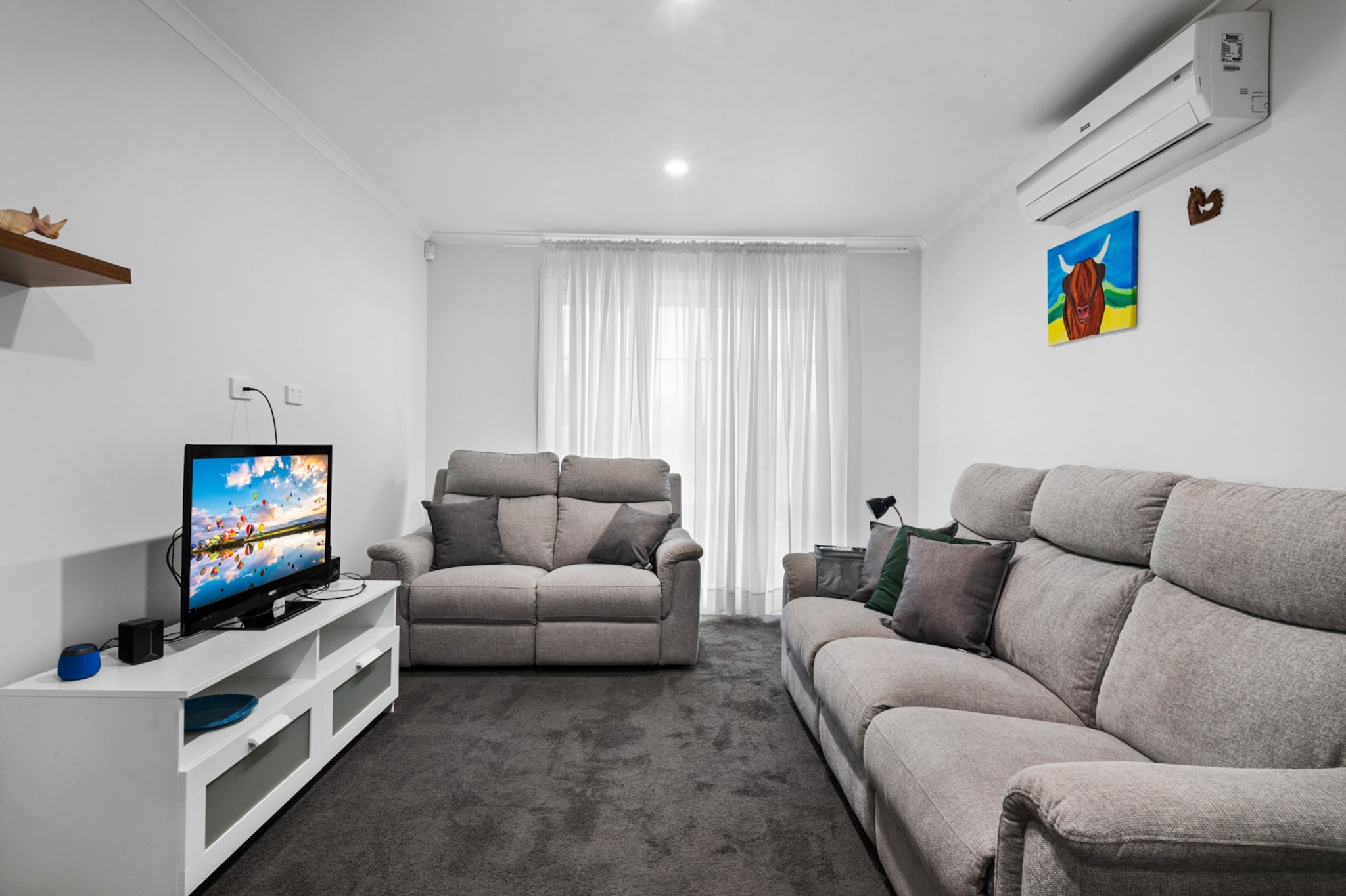 Property description
Enjoy a relaxed stay in this two-bedroom home in Hoppers Crossing, complete with private self-check in. Featuring a generous garden, private BBQ and convenient carport parking, this welcoming property is ideal for families or small groups. With a peaceful setting and practical amenities throughout, it offers a comfortable base for both short visits and longer stays.
The space
Step inside to a bright and comfortable living area finished with soft carpeting underfoot. A generous five-seater sofa creates the perfect place to unwind, while the dining area with seating for four invites shared meals and relaxed evenings indoors. The reverse-cycle split system in the living room ensures comfort across seasons.
 
The kitchen is fully equipped with essential cookware, gas stovetop, electric oven and dishwasher, offering everything needed for easy meal preparation. A private laundry adds everyday convenience.
 
The home features two well-proportioned bedrooms. The main bedroom includes a queen bed, while the second bedroom offers a trundle bed, ideal for flexible sleeping arrangements. Blackout blinds provide added privacy and restful nights. Heating is available, and one bedroom includes a fan for additional comfort.
 
The bathroom is centrally located and fitted with a shower, toilet and vanity, complemented by storage and a hairdryer.
 
Outside, a spacious garden provides room to relax, complete with outdoor furniture and a private gas BBQ. Accessible via the laundry, this outdoor area is perfect for enjoying fresh air and casual dining.