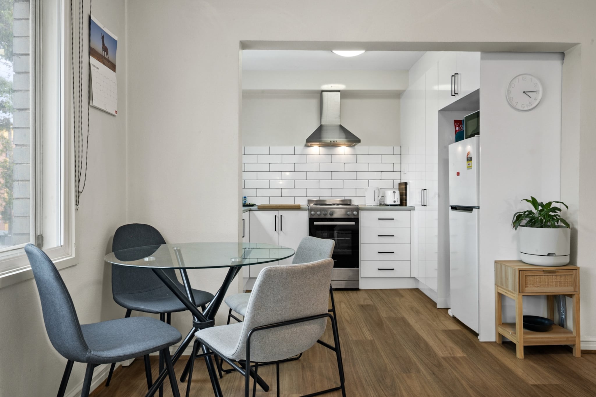 Property description
Enjoy a relaxed stay in this well-maintained two-bedroom apartment in Flemington. Featuring a bright living area, private entrance, and onsite carport parking, it offers comfort and convenience for families or small groups. Self check-in making arrivals seamless. Ideally positioned near local cafés, parks, and transport links for easy access to Melbourne’s CBD.
The space
Step inside to a welcoming living area with warm wooden flooring and natural light filtering through the windows. The lounge comfortably seats four, complemented by a coffee table and Smart TV for relaxed evenings in. A dining setting for four sits nearby, creating an easy flow between living, dining, and kitchen spaces.
 
The kitchen is practical and well-equipped, featuring an electric stovetop, oven, microwave, dishwasher, and coffee machine—ideal for preparing meals at home. Thoughtfully arranged cabinetry provides ample storage, keeping the space uncluttered and functional.
 
The apartment offers two comfortable bedrooms, with two queen beds. Each room includes blackout blinds, heating, and a fan to ensure comfort across seasons. Bedside tables and lamps add a homely touch, while wooden hangers and mattress protectors enhance convenience.
 
The bathroom is centrally located and well maintained, complete with a shower, toilet, vanity, hairdryer, and storage space. A private laundry with washing machine is also available, making longer stays effortless.