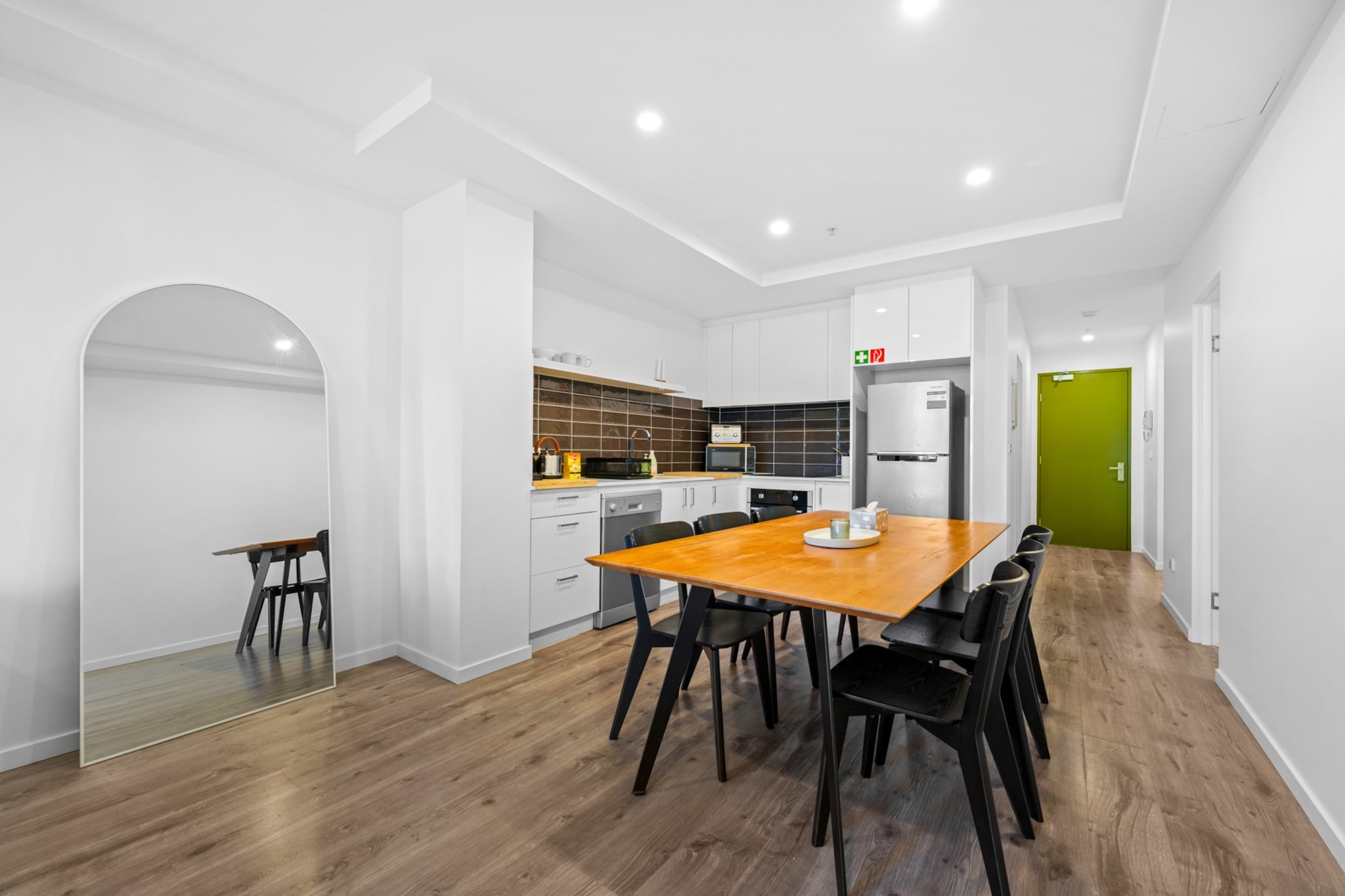 Property description
Set opposite Victoria Park in the heart of Abbotsford, this inviting two-bedroom apartment offers relaxed inner-city living with a private yard and leafy garden views. Enjoy seamless self check-in with a smart lock, fast Wi-Fi, air conditioning and easy access to cafés, river trails and public transport. Ideal for families, small groups or business travellers seeking comfort close to the CBD.
The space
Designed for comfort and ease, this welcoming apartment blends bright interiors with practical living. The open-plan lounge and dining area creates a relaxed setting to unwind, complete with comfortable seating and a dining table for shared meals or quiet mornings with coffee. Large windows draw in natural light while framing leafy garden outlooks.
 
The kitchen is thoughtfully equipped for home cooking, featuring modern appliances and ample bench space to prepare anything from a quick breakfast to a leisurely dinner.
 
The master bedroom offers a peaceful retreat with a queen bed, fresh cotton linen and built-in wardrobe storage, along with the added privacy of its own ensuite bathroom. The second bedroom includes a bunk bed, making it ideal for children or friends travelling together. A second modern bathroom ensures convenience for all guests.
 
Step outside to a fully fenced private backyard with outdoor furniture, perfect for enjoying fresh air in a tranquil setting. With in-unit laundry, air conditioning and bikes available for exploring nearby trails, the space is designed to make longer stays effortless and enjoyable.