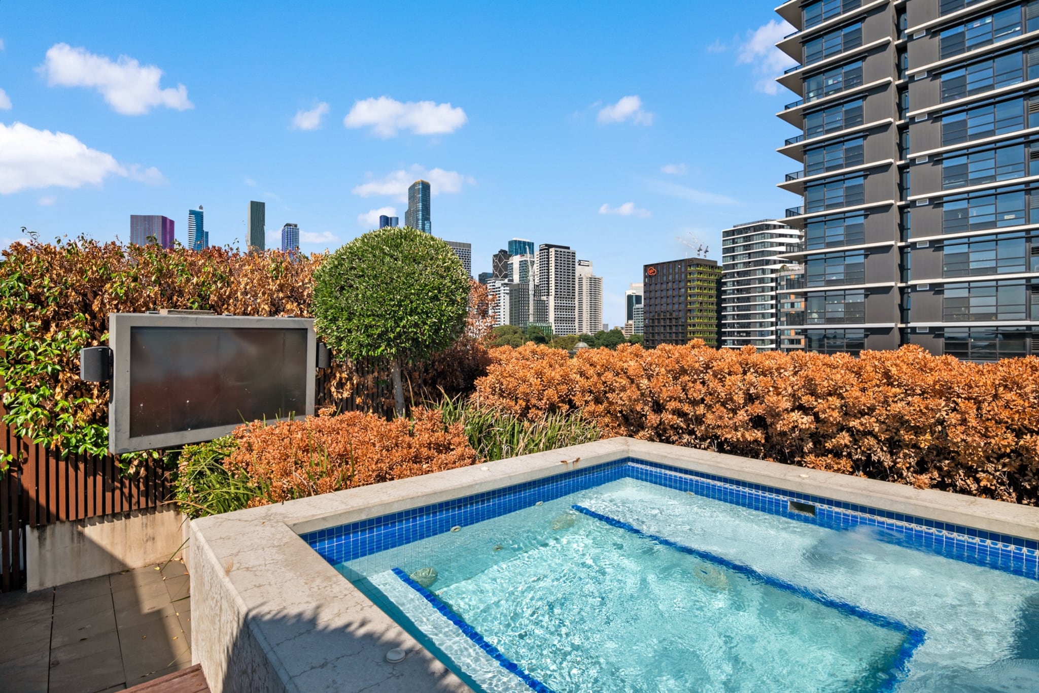 Property description
Located in the stylish Ikebana Apartments complex, this modern 1-bedroom apartment offers bright, light-filled interiors and a private balcony. Featuring open-plan living, a queen bedroom with blackout blinds, and a sofa bed for added flexibility, it’s ideal for couples or business travellers seeking comfort close to Melbourne’s CBD.
The space
Step into a contemporary apartment designed with clean finishes and an abundance of natural light. The open plan living area features warm wooden flooring and a comfortable four-seater couch that easily converts into a sofa bed by pulling the strips, offering flexible sleeping arrangements. A split-system air conditioner in the living room ensures comfort throughout the seasons.
 
The dining area includes a table with seating for two, complemented by two additional stools at the kitchen counter for casual meals. The kitchen is thoughtfully appointed with a gas cooktop, electric oven, dishwasher and capsule compatible coffee machine, making it easy to prepare meals at home.
 
The bedroom provides a peaceful retreat, complete with a queen bed, two bedside tables with lamps, built-in storage and blackout blinds to ensure restful sleep. The bathroom is modern and well-maintained, featuring a shower, vanity storage and essential amenities.
 
A private laundry is neatly integrated within the bathroom space. Sliding doors from the living area open onto a balcony with outdoor furniture, offering a pleasant space to enjoy fresh air in this vibrant inner city setting.