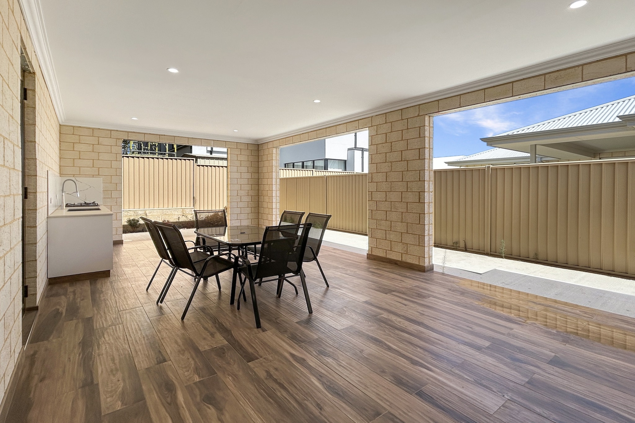 Property description
This spacious 4 bedroom home in Southern River offers open-plan living, generous dining space and a private outdoor area with BBQ. Featuring air conditioning and heating throughout, a double garage and driveway parking, it’s well suited to families or group stays seeking comfort and convenience in a peaceful suburban setting.
The space
Designed for easy family living, this well-presented home offers generous interiors and practical comforts throughout. The main living area features stylish grey tiled flooring and ample seating with an eleven-seater couch, creating a welcoming space to relax or gather together. A television with remote control provides simple entertainment, while artificial plants and wall art add decorative touches.
 
The open-plan layout flows into the dining area, where a large table with seating for eight makes shared meals effortless. The kitchen is well equipped with a gas cooktop, electric oven, dishwasher and capsule-compatible coffee machine. With plenty of bench space and essential cookware, it’s ideal for preparing everyday meals.
 
Four bedrooms provide flexible sleeping arrangements, including one king bed, two double beds and one single bed. Each room includes bedside tables and lamps, with air conditioning and heating available throughout the home for year-round comfort.
 
Two bathrooms, including an en-suite attached to the main bedroom, offer modern finishes and practical storage. A private laundry with both washing machine and dryer adds further convenience.
 
Step outside through the back door to enjoy the outdoor furniture and BBQ area, perfect for casual dining.