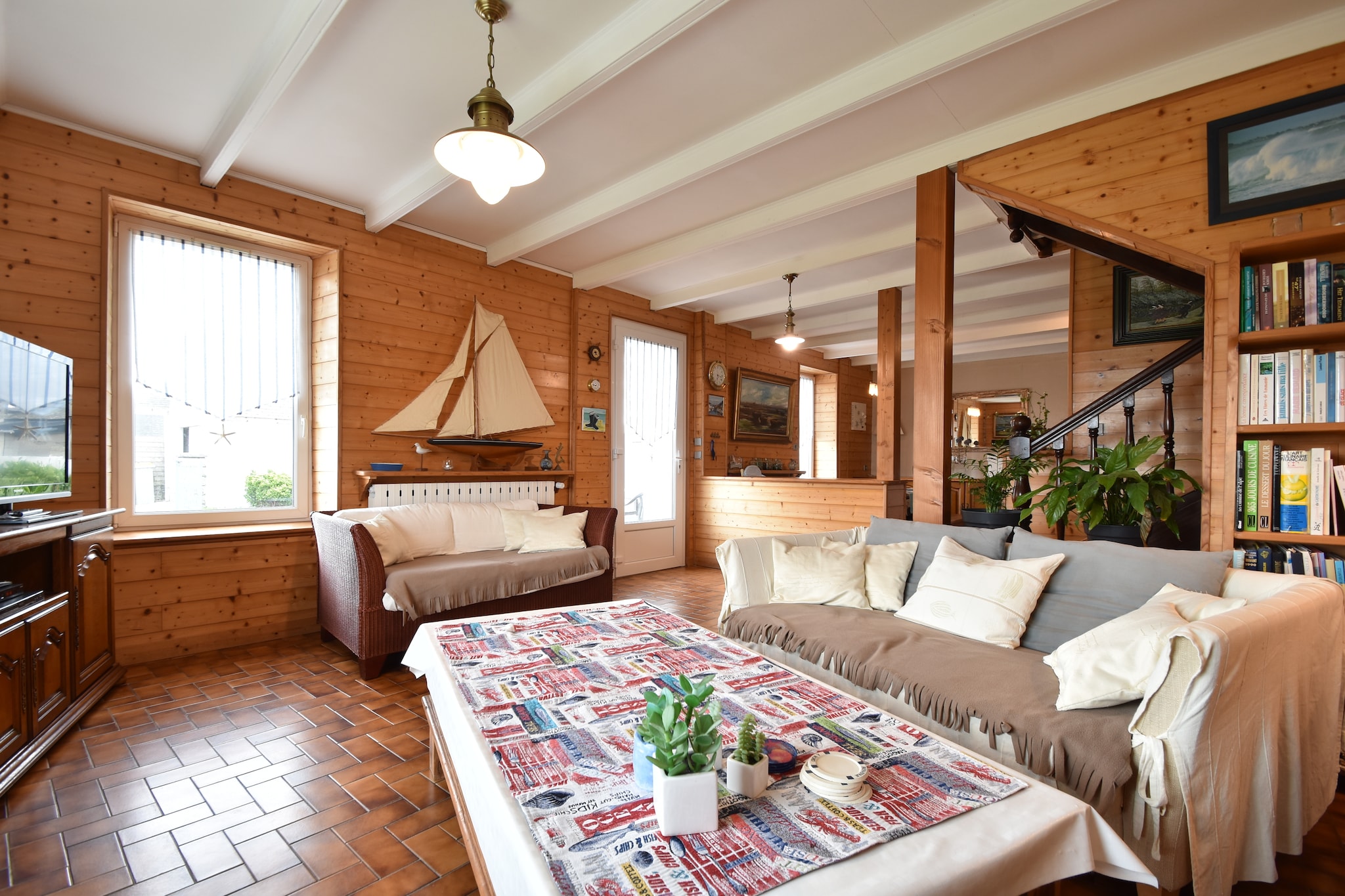 This picturesque holiday home in Saint-Guénolé, Penmarch is a cozy retreat ideal for families or small groups. With three bedrooms, it comfortably accommodates up to six guests. The house features a roofed terrace, garden furniture, and a barbecue—perfect for relaxing afternoons or evening meals. Inside, it offers heating, a well-equipped kitchen, and child-friendly amenities like a high chair and children’s bed.
Located just 500 meters from the sea, the home is a short walk from scenic coastal views and beachside strolls. The town center, grocery store, and restaurants are all within 2 km, making daily errands and dining out convenient. For adventure seekers, the famous surf spot La Torche is only a 10-minute drive, while tennis courts and the iconic Phare d’Eckmühl lighthouse are nearby.
Set on Route de Viben, this charming home blends comfort with location. Whether you're sipping tea on the terrace or exploring the vibrant surroundings, it offers a relaxing base to enjoy Brittany’s coastal charm.