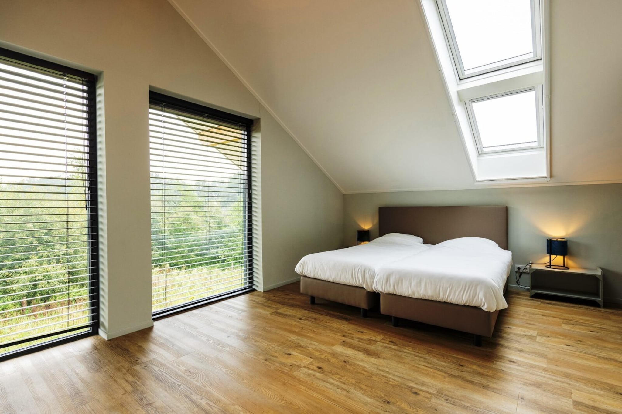 Ground floor: (Entrance, Living room(TV, fireplace, seating area), Kitchen(dining table, hob, electric kettle, cooker, coffee machine, oven, microwave, dishwasher, fridge-freezer), toilet)\n\nOn the 1st floor: (bedroom(double bed box), bedroom(double bed box), bedroom(double bed box), bedroom(double bed box), bedroom(double bed box), bedroom(double bed box), bedroom(bunk bed), bedroom(bunk bed), bedroom(bunk bed), Bedroom with bathroom(double bed, shower, washbasin, toilet), bathroom(bath tub, shower, washbasin, toilet), bathroom(shower, washbasin, toilet), bathroom(shower, washbasin, toilet), bathroom(shower, washbasin, toilet), bathroom(shower, washbasin, toilet), bathroom(shower, washbasin, toilet), bathroom(shower, washbasin, toilet), bathroom(shower, washbasin, toilet))\n\nrecreation room(TV, seating area, table tennis table), sauna, veranda, fridge-freezer, tumble dryer, shower, washing machine, terrace, garden, sun loungers, BBQ, parking, trampoline, swimming pool(shared with other guests, outside, heated), high chair, lounge set, outdoor fireplace, Swing set