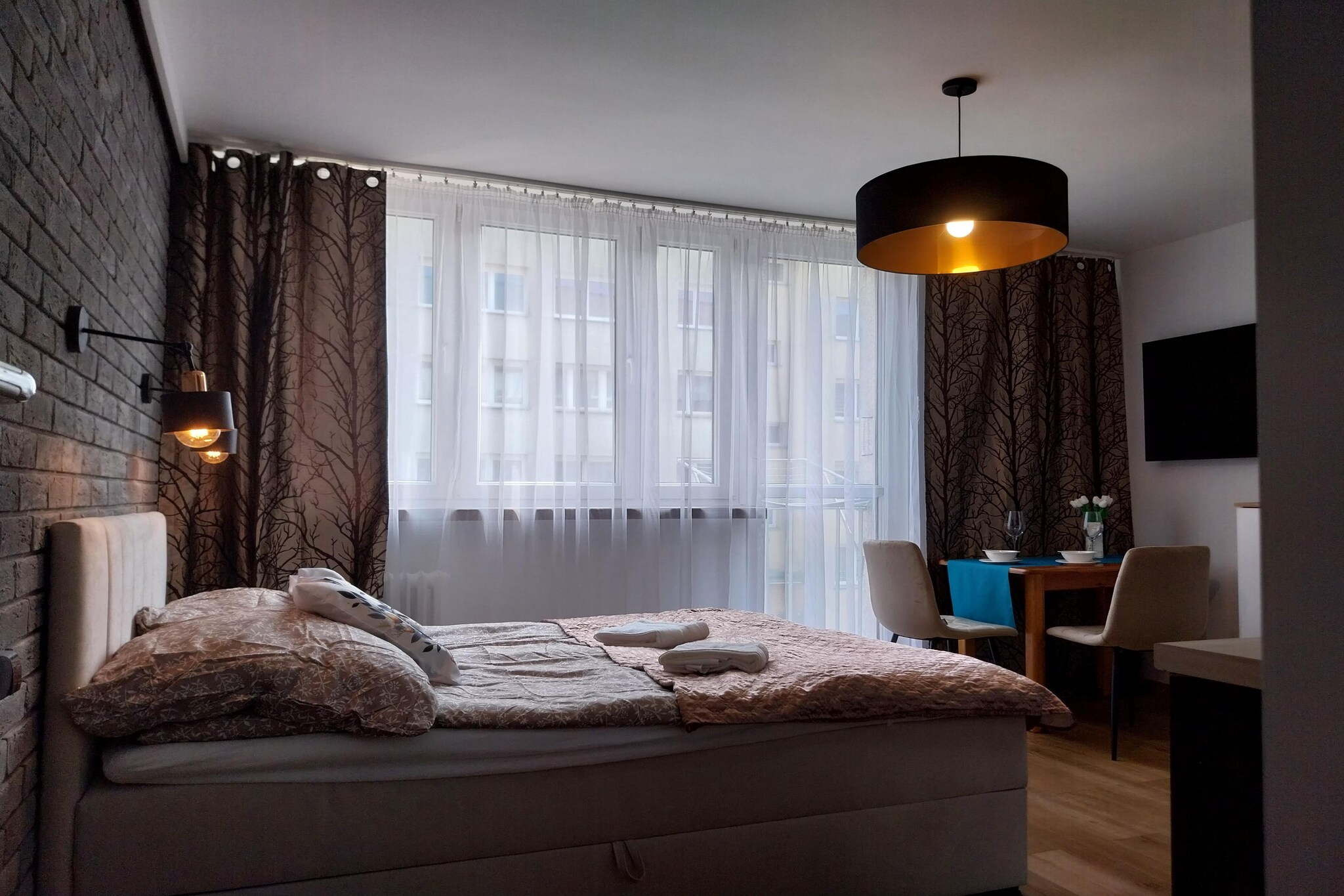 On the 1st floor: (open kitchen(electric kettle, boiling water tap, toaster, cooker(2 ring stoves, electric), espresso machine, dishwasher, fridge-freezer), Living/bed room(double bed, TV(satellite, german television channels), dining table), bathroom(shower, washbasin, toilet, washing machine))\n\nInternet access