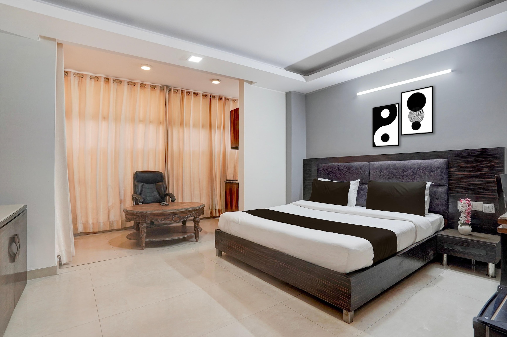 Comfortable Accommodations: Super Townhouse Millenium City Centre in Gurgaon offers family rooms with air-conditioning, private bathrooms, work desks, and free toiletries. Each room includes a TV, wardrobe, and seating area.

Dining Experience: The family-friendly restaurant serves Indian cuisine for lunch and dinner. Guests can enjoy a continental or à la carte breakfast.

Convenient Facilities: The hotel features a lift, 24-hour front desk, daily housekeeping, room service, and luggage storage. Free WiFi is available throughout the property.

Nearby Attractions: MG Road is 3.2 km away, WorldMark Gurgaon 10 km, and Delhi International Airport 12 km from the hotel.

Couples in particular like the location – they rated it 8.7 for a two-person trip.

1.Unmarried couples are warmly welcome at this property.
2. Guests with local ID proof are warmly welcome.
3.Foreign guests are welcome and allowed to stay at this property without any restrictions

4.Early Check-In Policy: A full day’s room rate will be charged for check-ins before 6:00 AM. Complimentary early check-in is available between 6:00 AM and 10:00 AM, subject to room availability.

5.Check-in is only available to guests aged 18 and above. Please provide a government-issued ID to confirm your age.
