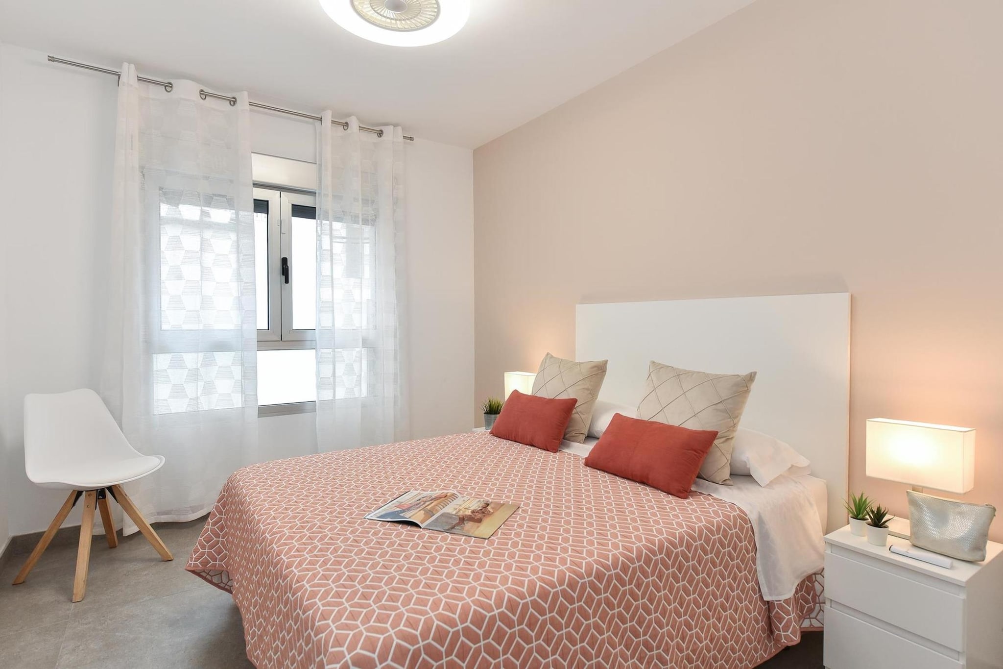 On the 1st floor: (Kitchen(hob(ceramic), electric kettle, toaster, coffee machine, espresso machine, oven, microwave, dishwasher, fridge-freezer, hairdryer, Juicer, dishes and cutlery, Cooking basics), Living/diningroom(TV(flatscreen, smart TV), dining table, seating area), bedroom(double bed), bedroom(single bed), bathroom(shower, washbasin, toilet, hairdryer))\n\nInternet access, Beach, cot, solarium, washing machine, balcony, terrace, sun loungers, lift, high chair, ironing board, iron