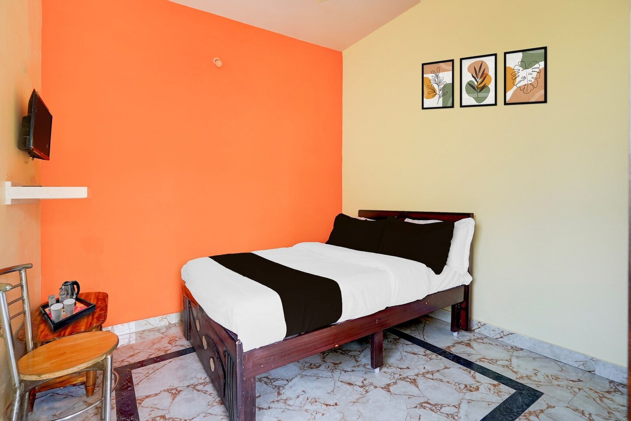 Comfortable Accommodations: Super Hotel O Ramachandrapuram in Bengaluru offers family rooms with air-conditioning, private bathrooms, work desks, and seating areas. Each room includes free toiletries, a bath or shower, TV, and tiled floors.

Essential Facilities: Guests enjoy free WiFi, a lift, 24-hour front desk, daily housekeeping service, room service, and luggage storage. The hotel provides a continental breakfast and a variety of amenities to ensure a pleasant stay.

Prime Location: Located 16 minutes from Bangalore City Railway Station, the hotel is close to attractions such as Cubbon Park (4 km), Indira Gandhi Musical Fountain Park (4.1 km), and Bangalore Palace (6 km). Kempegowda International Airport is 37 km away.

Check-in is only available to guests aged 18 and above. Please provide a government-issued ID to confirm your age.