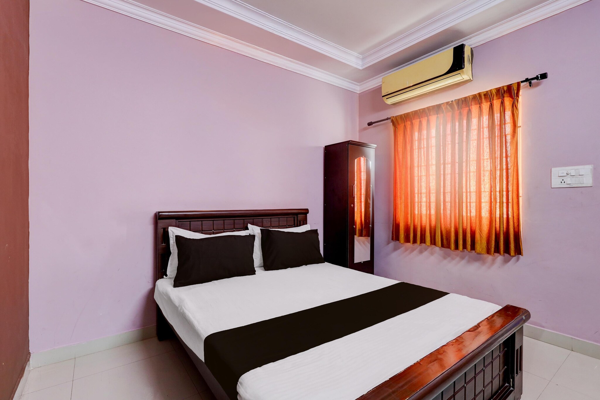 Comfortable Accommodations: Hotel O Ramachandra Hospital Porur Formerly Raj Mahal in Chennai offers family rooms with air-conditioning, private bathrooms, work desks, and free WiFi. Each room includes a seating area, TV, and free toiletries.
Convenient Facilities: Guests benefit from a lift, 24-hour front desk, daily housekeeping, room service, and luggage storage. Free on-site parking is available.
Prime Location: Located 3 km from Chennai International Airport, the hotel is near Chennai Trade Centre (4.4 km), St. Thomas Mount (6 km), and Anna University (10 km).
Early Check-In Policy: A full day’s room rate will be charged for check-ins before 6:00 AM. Complimentary early check-in is available between 6:00 AM and 10:00 AM, subject to room availability.
Check-in is only available to guests aged 18 and above. Please provide a government-issued ID to confirm your age.