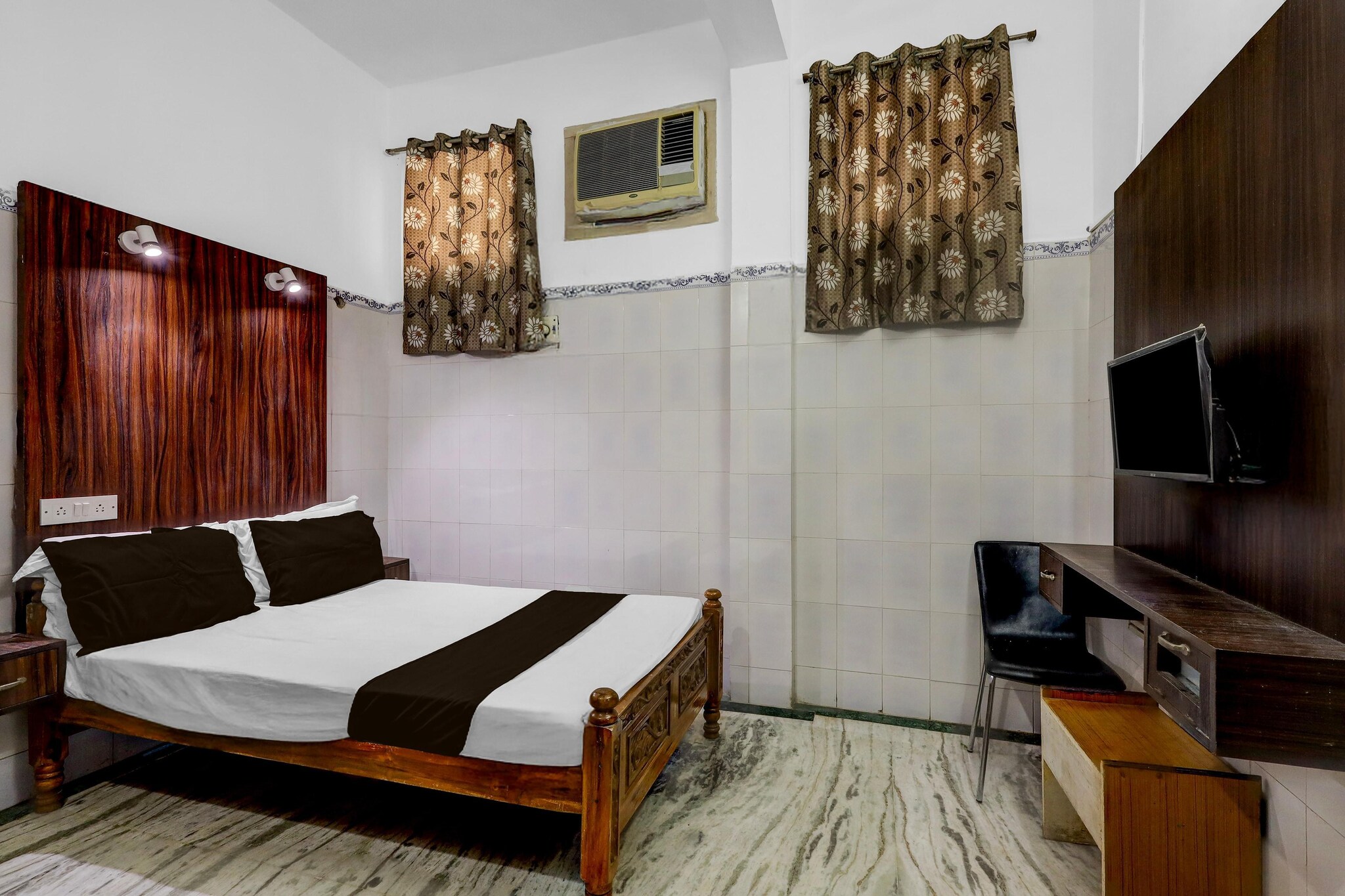 Enjoy a comfortable and hassle-free experience at our thoughtfully designed property. Each room is equipped with modern amenities, cozy bedding, and elegant decor to make you feel right at home. Located conveniently with easy access to public transport and major attractions, it's perfect for both business and leisure travelers. Cleanliness and guest comfort are our top priorities, and our team is available 24/7 to assist you throughout your stay.
 
Unmarried couples are warmly welcome at this property.
Guests with local ID proof are warmly welcome.
Foreign guests are welcome and allowed to stay at this property without any restrictions
Early Check-In Policy: A full day’s room rate will be charged for check-ins before 6:00 AM. Complimentary early check-in is available between 6:00 AM and 10:00 AM, subject to room availability.
 
Check-in is only available to guests aged 18 and above. Please provide a government-issued ID to confirm your age.