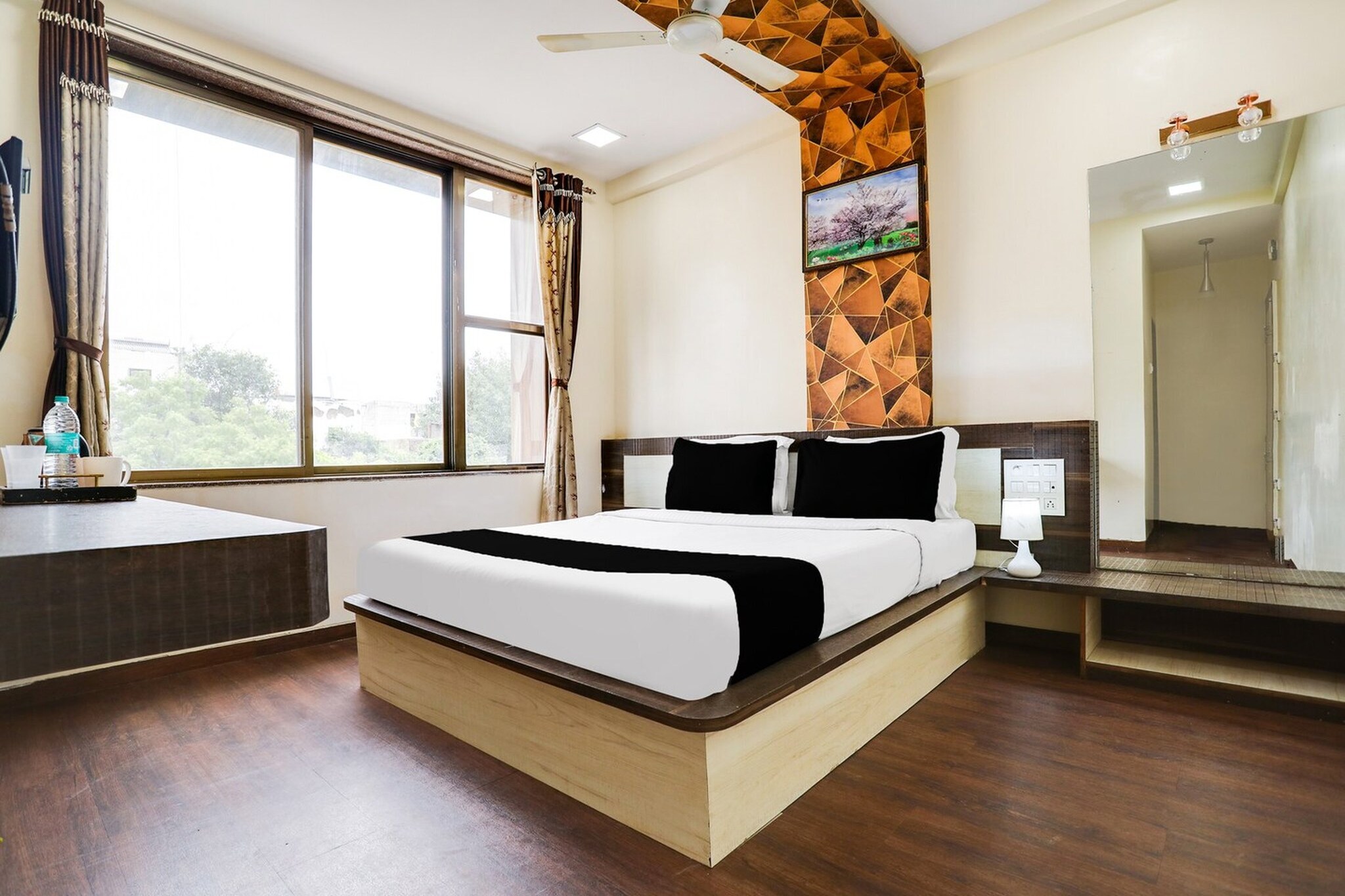 Comfortable Accommodations: Super Hotel O Palkhi Road Near Sai Baba Temple Formerly Netra Sai in Shirdi offers family rooms with air-conditioning, private bathrooms, work desks, and free WiFi throughout the property.
Dining Experience: A family-friendly restaurant serves Indian cuisine with a continental breakfast. Guests can relax in the lounge or enjoy meals in the comfortable seating areas.
Convenient Facilities: The hotel features a 24-hour front desk, free on-site parking, room service, housekeeping, and luggage storage. Additional amenities include a lift and free toiletries.
Prime Location: Located 14 km from Shirdi Airport, the hotel is a short walk from Saibaba Temple and near attractions such as Sai Heritage Village and Wet N Joy Water Park.
Unmarried couples are warmly welcome at this property.
Guests with local ID proof are warmly welcome.
Early Check-In Policy: A full day’s room rate will be charged for check-ins before 6:00 AM. Complimentary early check-in is available between 6:00 AM and 10:00 AM, subject to room availability.
Check-in is only available to guests aged 18 and above. Please provide a government-issued ID to confirm your age.