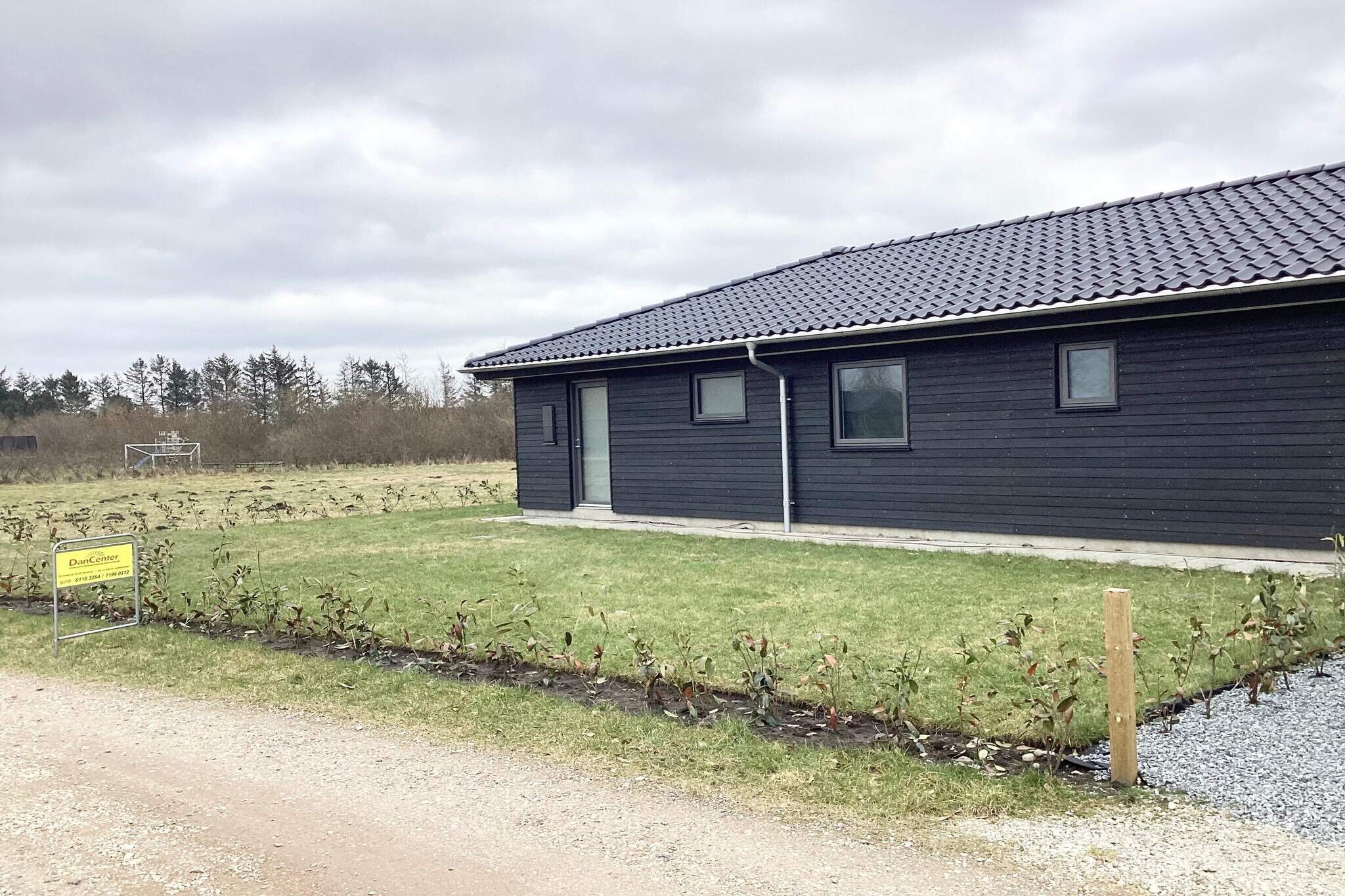 This modern holiday home, built in 2026, provides the perfect setting for a relaxing holiday with family and friends. The house is designed with a focus on comfort, quality and good common areas, where up to 10 people can gather and enjoy each other's company. The house's natural gathering point is the large and bright kitchen/family room, where there is plenty of space for communal cooking, cozy meals and long evenings around the table. From here, there is direct access to a large, partially covered terrace, which invites you to relax in the open air – whatever the weather. The home contains 4 good rooms and a cozy loft, which will be especially a hit with the children. In addition, there are 2 beautiful bathrooms, and as an extra luxury, you can enjoy a relaxing moment in the house's infrared sauna. For both children and adults, the house offers a wonderful activity room with bobsleigh games, table tennis and TV - perfect for hours of entertainment and cozy competitions. The location is ideal with a short distance to a number of popular attractions such as LEGOLAND Billund, LEGO House, Givskud Zoo and Lalandia Billund. Nature is also close by, where you can enjoy a walk around Kvie Sø via the popular heart path. Here you get a holiday home where both relaxation, activities and good experiences come together.A refundable deposit might be charged closer to your check-in date. The security deposit ensures a smooth stay and covers any additional services or consumption charges.This deposit covers utilities consumed during your stay and any additional services that may be taken.The final amount will be adjusted based on actual meter readings, actual usage of extra services, and any remaining balance will be refunded within 21 days after checkout.This deposit simply acts as a prepayment for charges that you would anyways pay for, ensuring a seamless stay and check-out experience.