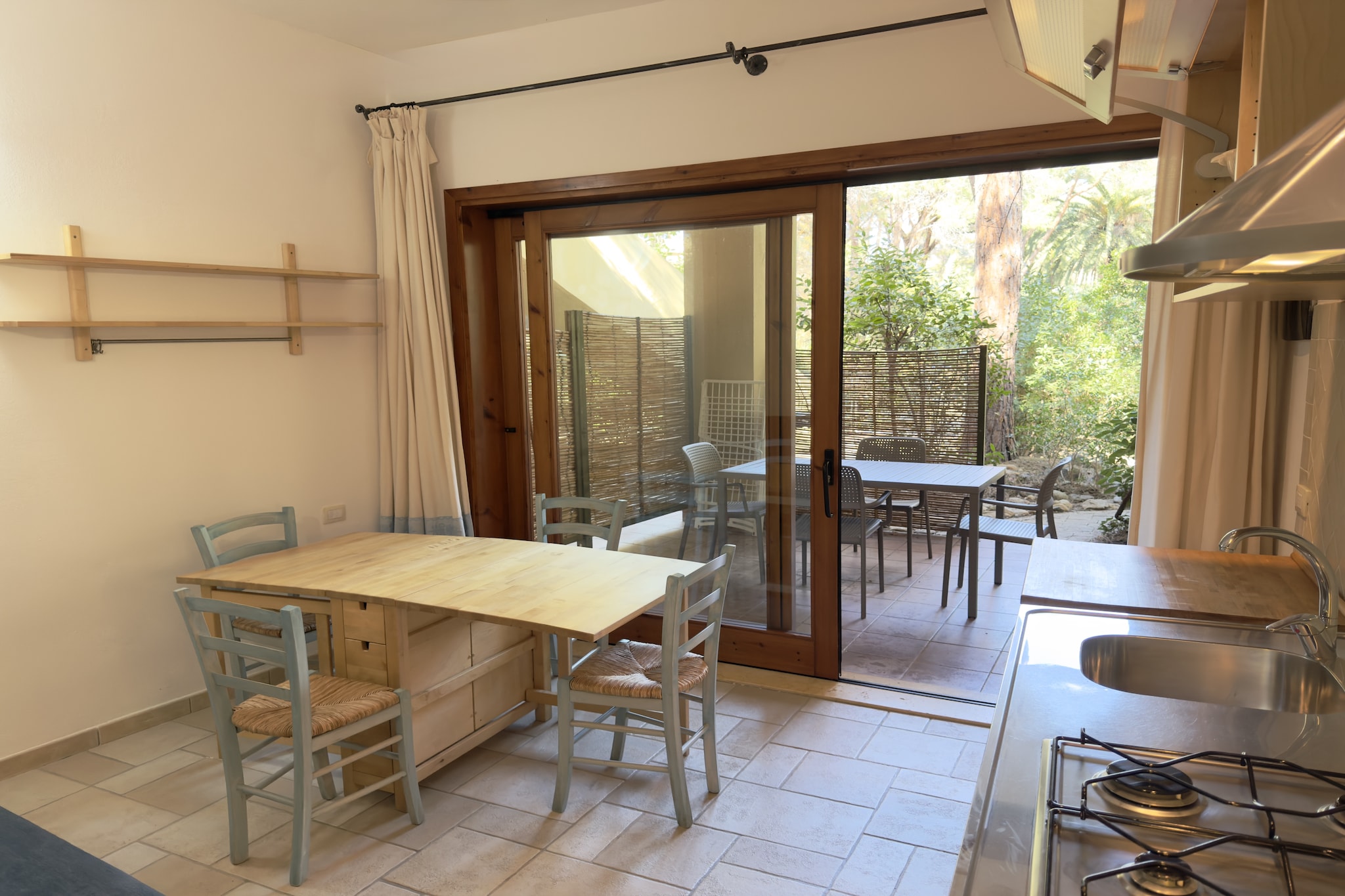The Abbaechelu Residence is located in Santa Margherita di Pula, nestled in the quiet pine forest of Pinus Village. Its location allows guests to enjoy a secluded and relaxing natural setting, just a short distance from the sea, 350 meters from Pinus Village beach and 700 meters from Santa Margherita di Pula beach. The residence, accessible to guests with disabilities, consists of ground-floor apartments with patios.
The property is approximately 10 km from the center of Pula, with its many restaurants and activities. A car is recommended.

CITY TAX to be paid on site in cash.

This is what your holiday complex offers:
- Reception
- Restaurant and bar (opening at the discretion of the private manager)
- Shared outdoor pool with children's area, open from the beginning of April to the end of October, weather permitting
- Partial Wi-Fi
- Mobility: Not suitable for guests with reduced mobility
- Transfers available upon request
- Guest telephone number is required for all reservations.