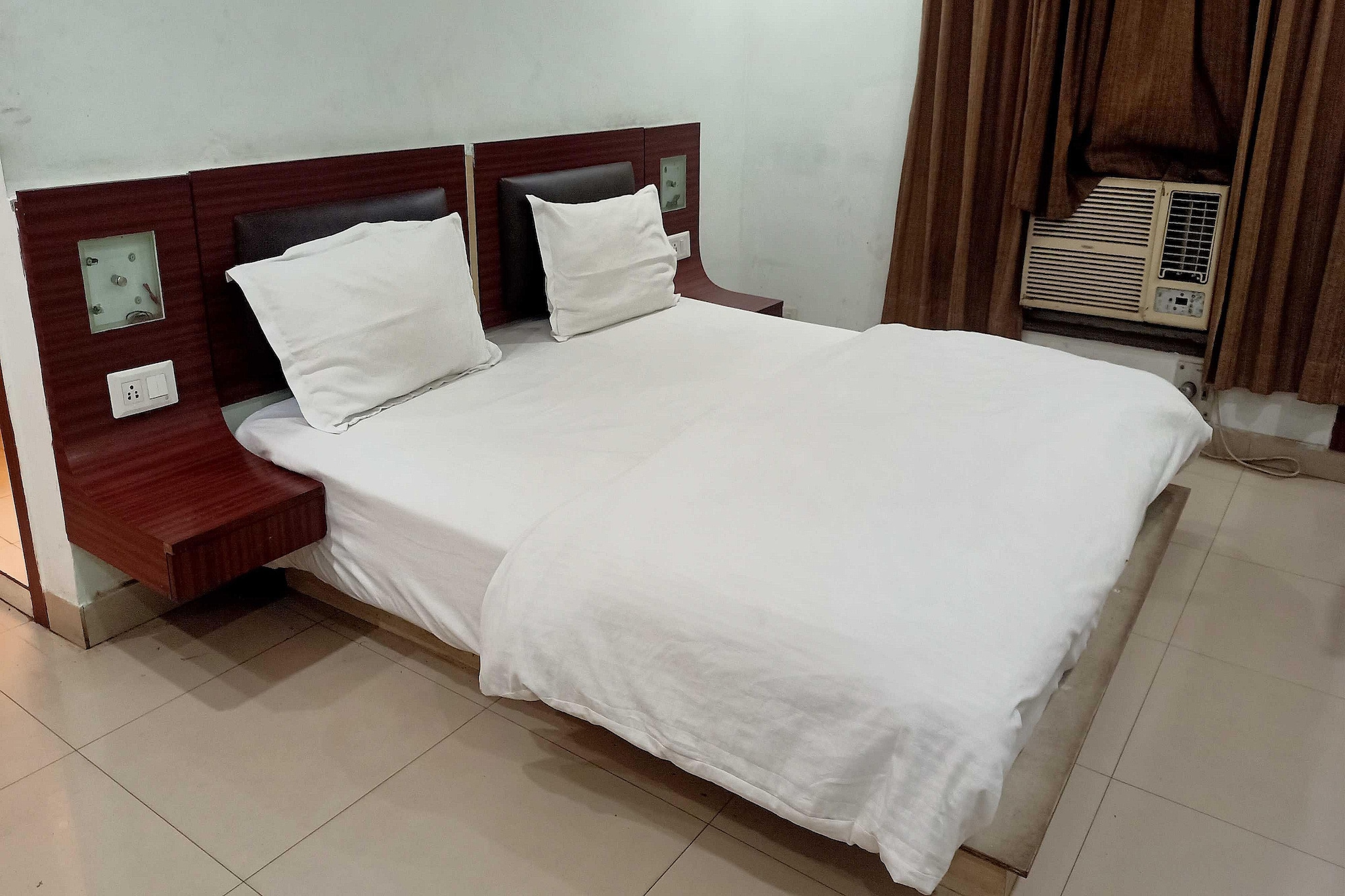 Enjoy a comfortable and hassle-free experience at our thoughtfully designed property. Each room is equipped with modern amenities, cozy bedding, and elegant decor to make you feel right at home. Located conveniently with easy access to public transport and major attractions, it's perfect for both business and leisure travelers. Cleanliness and guest comfort are our top priorities, and our team is available 24/7 to assist you throughout your stay.
Unmarried couples are warmly welcome at this property.
Guests with local ID proof are warmly welcome.
Foreign guests are welcome and allowed to stay at this property without any restrictions
Early Check-In Policy: A full day’s room rate will be charged for check-ins before 6:00 AM. Complimentary early check-in is available between 6:00 AM and 10:00 AM, subject to room availability.
Check-in is only available to guests aged 18 and above. Please provide a government-issued ID to confirm your age.