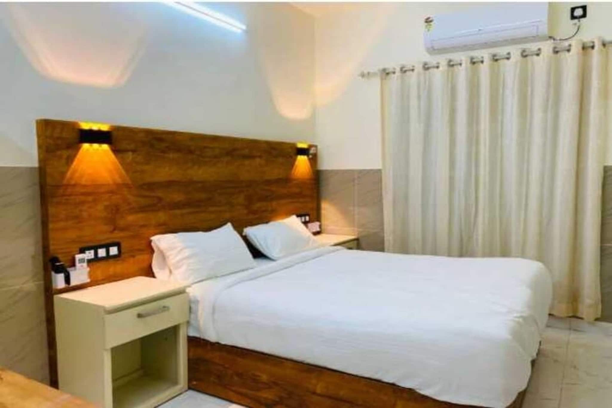 Enjoy a comfortable and hassle-free experience at our thoughtfully designed property. Each room is equipped with modern amenities, cozy bedding, and elegant decor to make you feel right at home. Located conveniently with easy access to public transport and major attractions, it's perfect for both business and leisure travelers. Cleanliness and guest comfort are our top priorities, and our team is available 24/7 to assist you throughout your stay.
 
Unmarried couples are warmly welcome at this property.
Guests with local ID proof are warmly welcome.
Foreign guests are welcome and allowed to stay at this property without any restrictions
Early Check-In Policy: A full day’s room rate will be charged for check-ins before 6:00 AM. Complimentary early check-in is available between 6:00 AM and 10:00 AM, subject to room availability.
 
Check-in is only available to guests aged 18 and above. Please provide a government-issued ID to confirm your age.