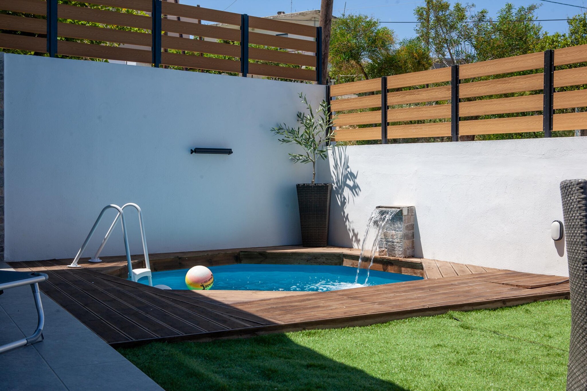 Set in a calm residential area of Crete, this modern villa offers a private setting where open outdoor space and relaxed surroundings define the stay. Designed for comfort and flexibility, the property is well-suited for families or groups looking to enjoy a quieter base within reach of beaches and nearby towns.
Inside, the villa features three bedrooms accommodating six guests across a mix of double and bunk beds, creating a flexible layout for different group types. The living area is bright and functional, with comfortable seating, a television and a dining space designed for shared use. A fully equipped kitchen includes appliances such as an oven, refrigerator, dishwasher and coffee machine, making everyday cooking practical. The property also includes one or more bathrooms with a shower or bath, along with amenities such as WiFi, air conditioning, a washing machine and private parking to support a convenient stay.
Outside, the villa centres around a private swimming pool with surrounding terrace space, offering a relaxed setting for sunbathing or spending time outdoors. A furnished terrace and garden area provide space for outdoor dining or quiet moments, making it easy to enjoy the warm climate throughout the day.
Located within driving distance of coastal areas and local villages, the villa provides access to beaches, restaurants and everyday amenities. Guests can explore nearby towns, enjoy water activities or take day trips across the island, while returning to a private and comfortable setting at the end of the day.
