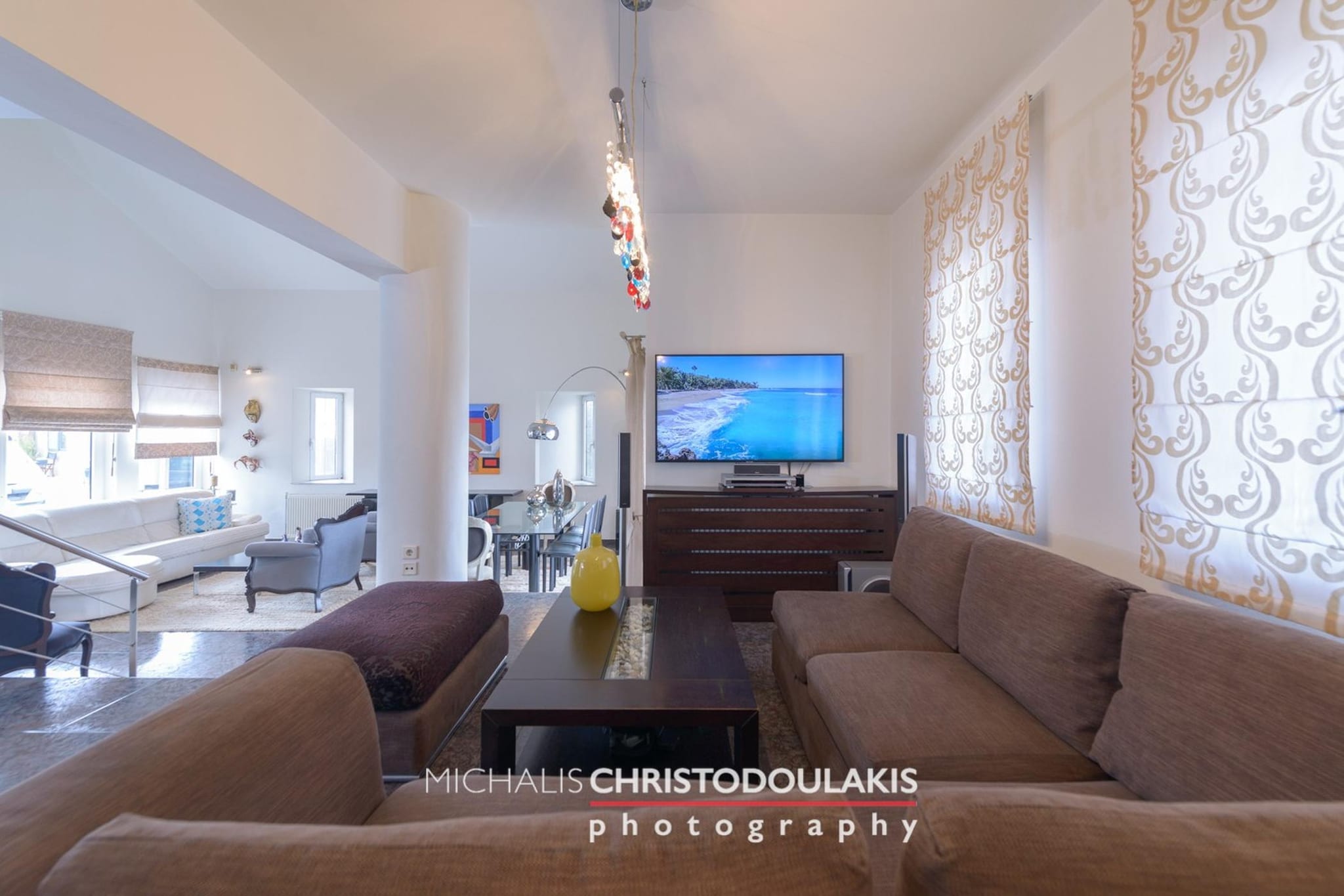 Surrounded by olive trees and open landscapes near Heraklion, this spacious villa offers a quiet countryside setting where privacy and nature define the experience. With views stretching from the sea to the mountains, it is well-suited for families or groups looking to stay in a calm environment while remaining close to the city and nearby attractions.

Inside, the villa features four bedrooms and accommodates up to ten guests, with double beds across the bedrooms and an additional double sofa bed in the living area, creating a flexible layout for group stays. The living space is open and comfortable, with seating, a television and a dining area designed for shared use. A fully equipped kitchen makes meal preparation practical. The property also includes multiple bathrooms with showers and additional features such as a hot tub, along with amenities including WiFi, air conditioning, a washing machine and private parking for everyday convenience.

Outside, the villa centres around a private swimming pool and a landscaped garden with a wood-fired oven and barbecue area, offering a well-designed space for outdoor dining and relaxation. The terrace and garden areas provide open views across the surrounding countryside, creating a setting for both daytime lounging and evening gatherings.

Located just a short drive from Heraklion, the villa provides easy access to cultural sites such as the Palace of Knossos, local markets and coastal areas. Nearby villages offer restaurants and everyday amenities within walking distance, allowing guests to combine quiet surroundings with convenient access to local life.