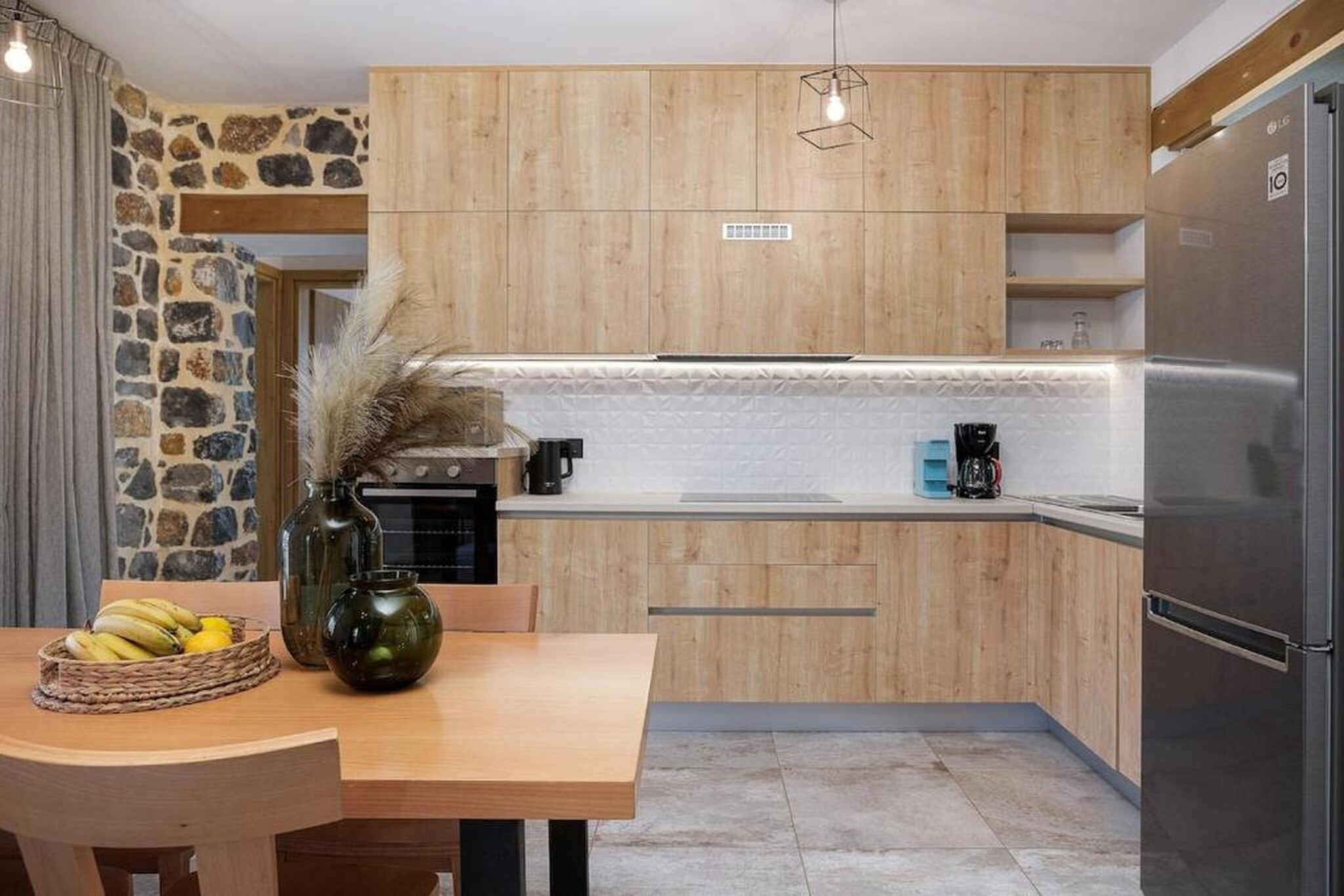 Ground floor: (open kitchen(stove, electric kettle, toaster, coffee machine, oven, microwave, dishwasher, fridge-freezer, dishes and cutlery, Cooking basics), Living/diningroom(TV(flatscreen, satellite), dining table, fireplace, seating area, radio, netflix), bathroom(shower, washbasin, toilet))\n\nOn the 1st floor: (bedroom(double bed), bedroom(single bed, single bed), bathroom(bath tub, washbasin, toilet, hairdryer))\n\nInternet access, washing machine, balcony, patio, heating, air conditioning, terrace, garden, garden furniture, sun loungers, BBQ, swimming pool(private), iron, Cleaning products