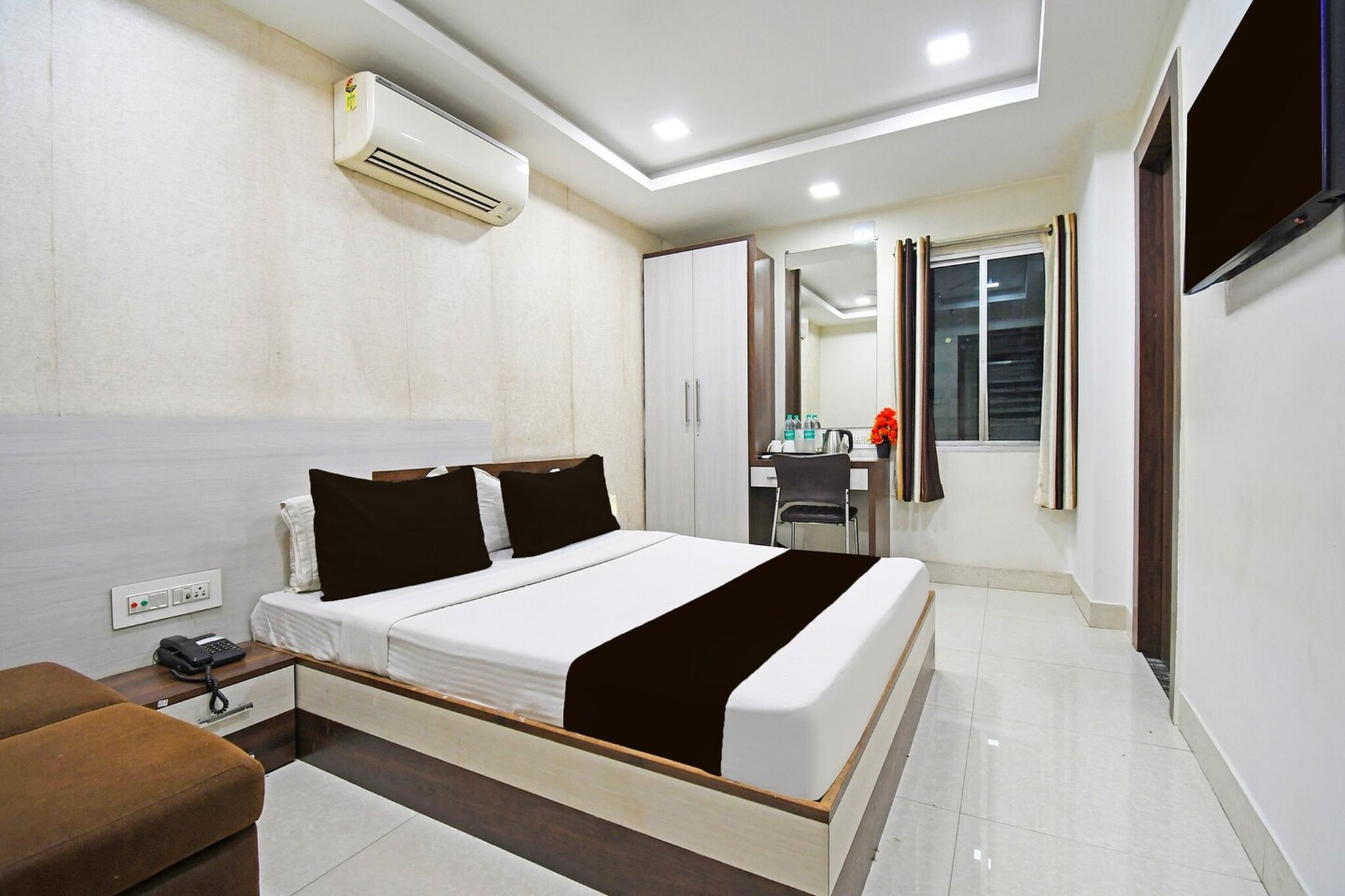 Comfortable Accommodations: Rooms feature air-conditioning, TV, and free WiFi throughout the property. Family rooms and amenities such as a lounge, elevator, and shared kitchen enhance guest comfort. Dining and Leisure: A family-friendly restaurant serves Indian cuisine for lunch and dinner. The bar provides a relaxing space for guests to unwind. include Jai Vilas Palace (1.9 mi) and Gwalior Fort (4.3 mi).
Unmarried couples are warmly welcome at this property.
Guests with local ID proof are warmly welcome.
Early Check-In Policy: A full day’s room rate will be charged for check-ins before 6:00 AM. Complimentary early check-in is available between 6:00 AM and 10:00 AM, subject to room availability.
Check-in is only available to guests aged 18 and above. Please provide a government-issued ID to confirm your age.