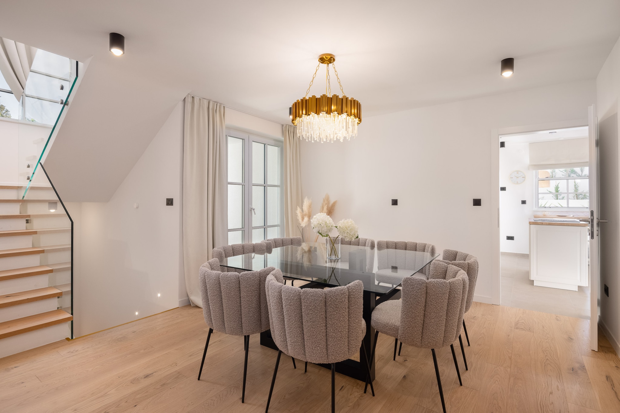 Ground floor: (open kitchen(electric kettle, toaster, coffee machine, oven, dishwasher, fridge, freezer, dishes and cutlery), Living/diningroom(TV(satellite), fireplace), Bedroom with bathroom(double bed, TV(satellite), shower, washbasin), toilet(toilet), toilet(toilet))\n\nOn the 1st floor: (Bedroom with bathroom(double bed, TV(satellite), bath tub, washbasin), Bedroom with bathroom(double bed, TV(satellite), shower, washbasin), Bedroom with bathroom(double bed, TV(satellite), shower, washbasin))\n\nInternet access, Garden Furniture , cot, hot tub, washing machine, heating(central), air conditioning, terrace, garden, BBQ, parking, swimming pool(private, outside, heated), high chair, iron, hairdryer, crib(free), Sea view