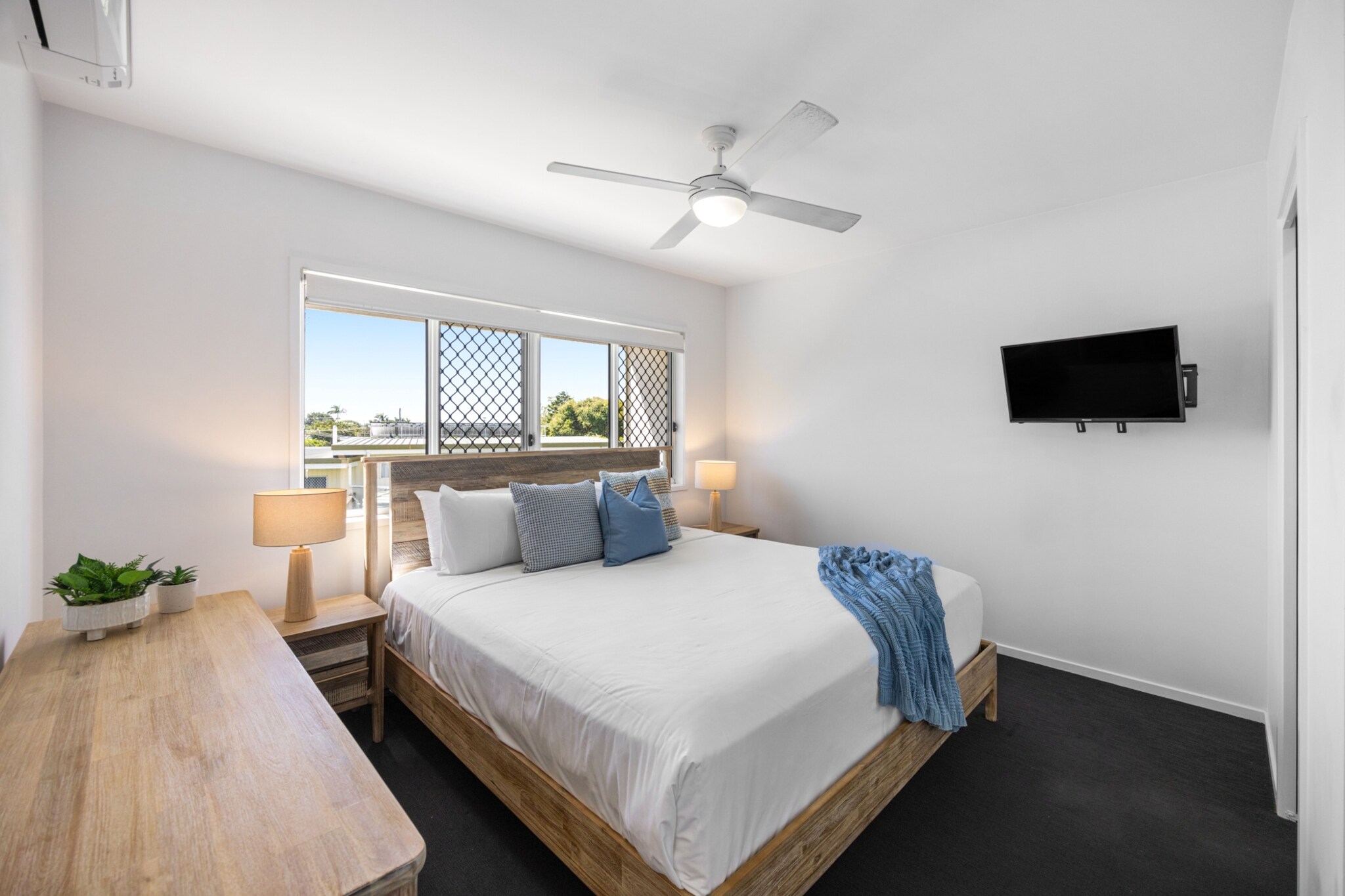 Property description
Located minutes from Maroochydore’s stunning beaches and Sunshine Plaza, this bright townhouse offers relaxed coastal living with open-plan interiors and a private alfresco area with BBQ. Enjoy seamless self-check-in and easy access to local cafés, shopping, and waterfront walks. With comfortable bedrooms, indoor and outdoor living spaces, and a peaceful setting, it’s an ideal base for exploring the Sunshine Coast.
The space
This welcoming townhouse blends relaxed coastal style with practical living spaces designed for comfort. The open-plan living and dining area creates a bright central hub, complete with a comfortable lounge that seats four and a dining table for shared meals. Large sliding doors connect the living area to a private outdoor patio, allowing natural light to flow inside and creating an easy indoor–outdoor lifestyle.
 
The kitchen is fully equipped for everyday cooking, featuring modern appliances and ample bench space. Whether preparing breakfast before a beach outing or enjoying a casual dinner indoors, the layout makes dining effortless.
 
Upstairs, the bedrooms provide peaceful retreats with soft furnishings and blackout blinds for restful sleep. The main bedroom includes a king bed and access to an ensuite bathroom, while the second bedroom offers a comfortable double bed. Ceiling fans in each bedroom and air conditioning in the main bedroom help maintain a pleasant temperature year-round.
 
Two bathrooms offer convenience and privacy for guests. Additional comforts include a study nook within the living area and a private laundry with both washer and dryer.
 
Outside, the alfresco patio with BBQ and outdoor seating provides the perfect spot for relaxed meals or evening gatherings after a day exploring the Sunshine Coast.