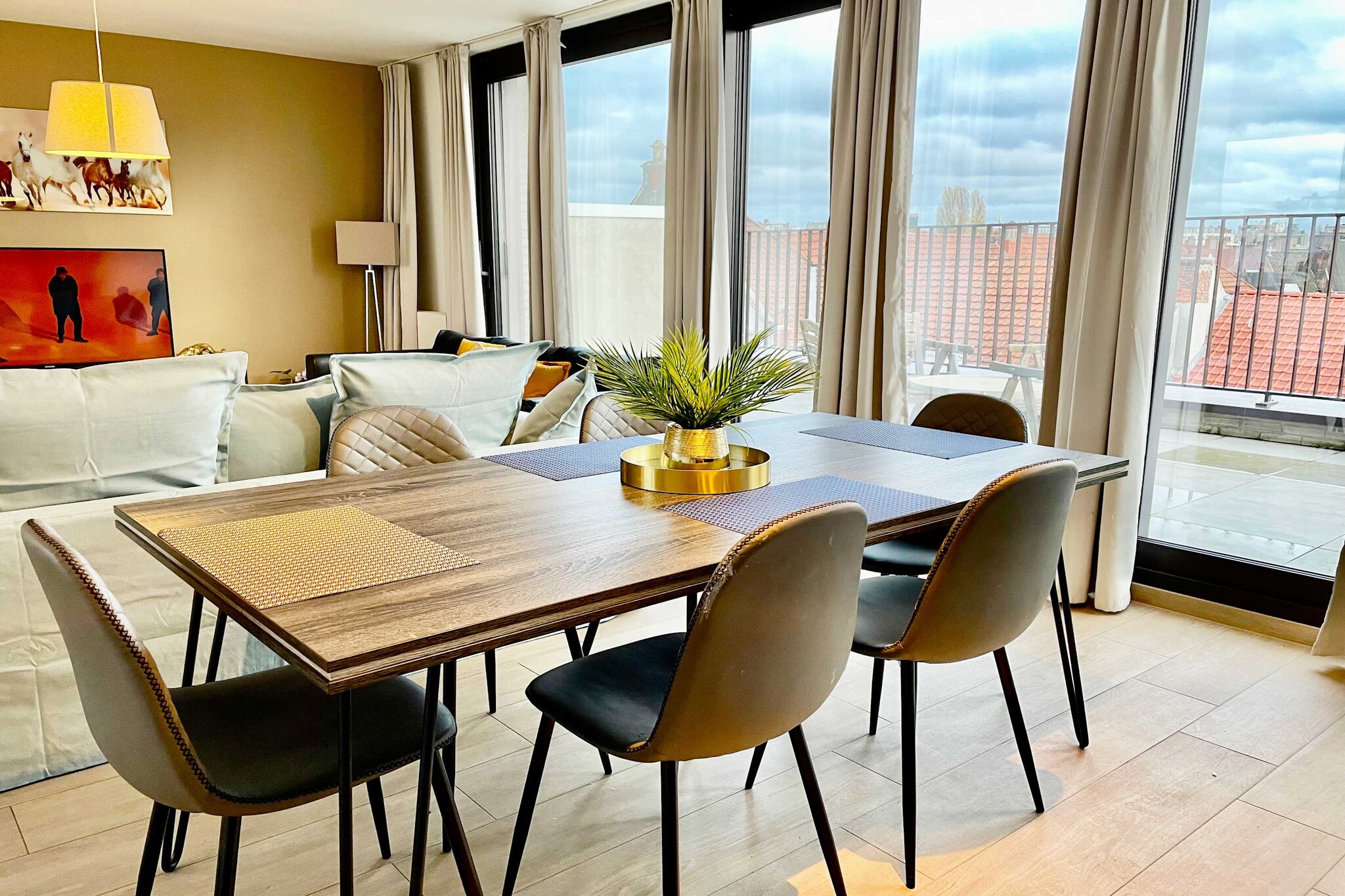 Located on Jacob Jordaensstraat in the heart of Antwerp, this design-forward penthouse by OneLuxStay offers a bright and modern sanctuary near the renowned Diamond District. With a facility score of 9.6 and a 4.8-star guest rating, the property provides an exceptional base for exploring the city's historic old town and vibrant urban rhythm. Guests will enjoy a refined, walkable environment that balances contemporary style with effortless accessibility to the neighborhood's best transit links and cultural highlights.

The interior is masterfully curated to accommodate up to four guests, featuring a master bedroom with a plush king-sized bed and a second bedroom equipped with bunk beds. For those balancing work and travel, a dedicated laptop-friendly workspace is provided alongside high-speed wireless internet. The kitchen is fully equipped for complete self-catering, including an oven, refrigerator, and coffee maker, while the in-unit washer and ample clothing storage offer added convenience for long-term stays.

The two well-appointed bathrooms are stocked with premium essentials, including a hairdryer, shampoo, and conditioner. Families are warmly welcomed, as the penthouse is fully suitable for both infants and children. Safety is prioritized with integrated heating and comprehensive smoke and carbon monoxide detection. Guests also benefit from the convenience of a luggage drop-off service and paid parking options located nearby. With its blend of superior design and central location, this OneLuxStay residence offers a distinguished experience in one of Antwerp's most iconic districts.