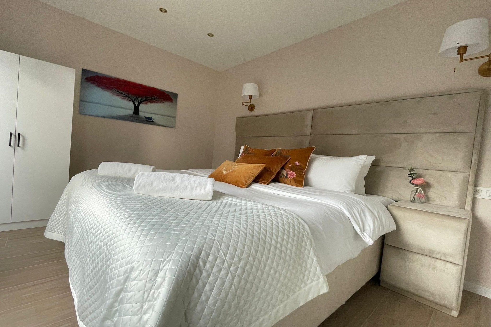 Located on Lange Kievitstraat just steps from Antwerp Central Station, this design-forward 3BR residence by OneLuxStay offers a bright and sophisticated sanctuary in a premier city location. With an exceptional guest rating, the property provides a calm, modern base for families or groups of up to six. Its prime position puts you at the gateway of the Diamond District and just a short stroll from the Antwerp Zoo and Chocolate Nation, the world’s largest Belgian chocolate museum.

The interior is masterfully curated to maximize space and comfort, featuring a primary bedroom with a plush king-sized bed and two additional bedrooms with comfortable single beds. With two well-appointed bathrooms, the suite provides a seamless routine for larger groups, complete with premium essentials like body soap, shampoo, and fresh towels. For those balancing work and travel, a dedicated laptop-friendly workspace is provided alongside high-speed wireless internet and a flat-screen TV. Cultural icons like the Rubens House and the high-end boutiques of the Meir are all within walking distance.

The kitchen is a chef’s delight, fully equipped for complete self-catering with a dishwasher, oven, microwave, stove, and toaster. Added conveniences such as an in-unit washer and dryer, extra pillows, and wine glasses for relaxing evenings make this an ideal choice for extended stays. Families are warmly welcomed, with the space being fully suitable for infants and children. Safety is prioritized with integrated heating and comprehensive smoke and carbon monoxide detection, while luggage drop-off services and nearby paid parking options ensure a stress-free experience in the heart of Antwerp.