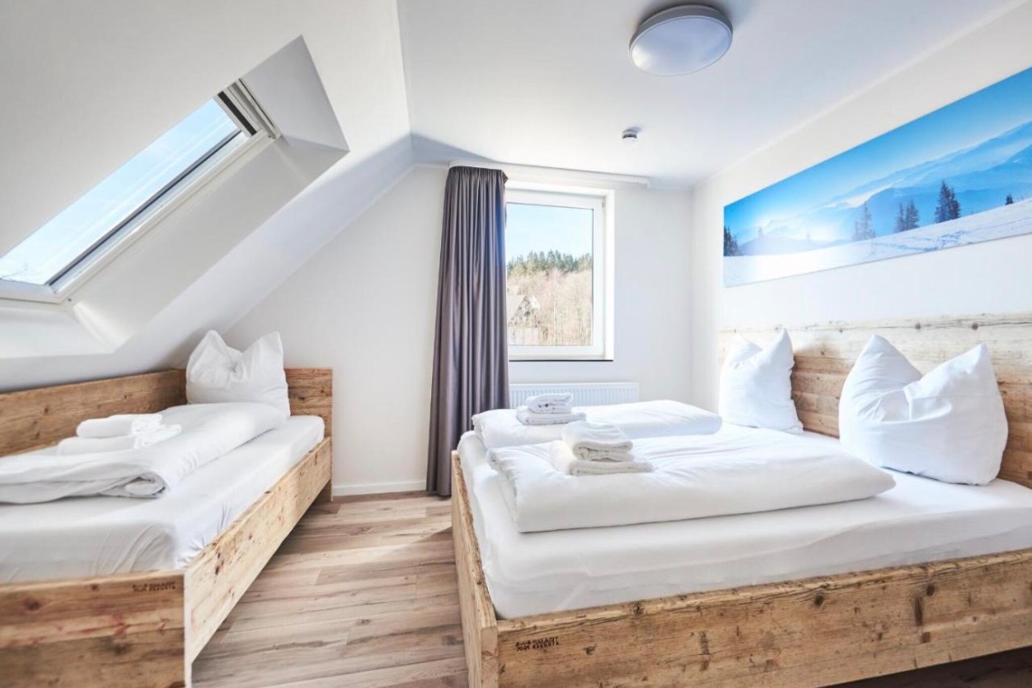 Kitchen(hob, electric kettle, toaster, coffee machine, combination microwave, dishwasher, fridge-freezer), Living/bed room(double sofa bed, TV, dining table, seating area), bedroom(single bed, double king size bed(160 x 200 cm)), bedroom(double king size bed(160 x 200 cm)), bathroom(shower, washbasin, toilet), Internet access, heating, parking