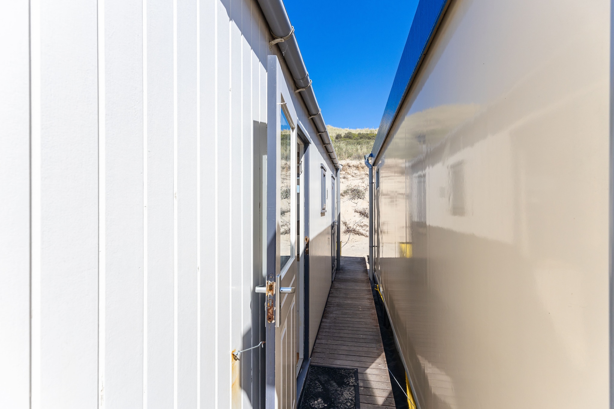 Beach sleep house near Dishoek directly by the sea with panoramic view and terrace, number 342 - Außenbereich Sommer