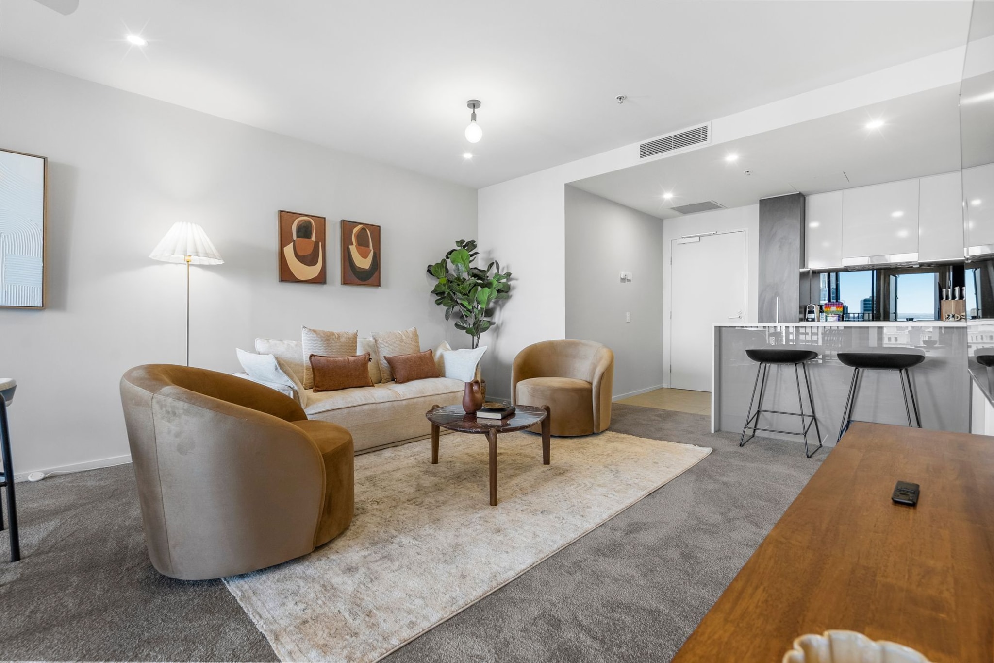 Property description
Positioned in the heart of Brisbane City, this 2-bedroom apartment offers elevated living with sweeping urban views. Enjoy a comfortable stay with central air conditioning, secure parking, and access to premium facilities including a pool, gym, and BBQ area. With convenient offsite key collection and the city’s dining, shopping, and riverfront just moments away, it’s ideal for both business and leisure stays.
The space
Perched high above the city, this apartment welcomes you with expansive views and a bright, open-plan layout. The living area is thoughtfully styled with a comfortable sofa and soft finishes, creating a relaxing space to unwind while enjoying the skyline beyond.
 
The adjoining dining area seats six and flows seamlessly into a well-appointed kitchen, offering ample space and functionality for preparing meals. Clean lines and contemporary finishes enhance the sense of openness throughout.
 
The bedrooms are designed for restful comfort, featuring a king bed, two single beds, and an additional sofa bed in the living area. Blackout blinds ensure a peaceful night’s sleep, while the master bedroom includes a private ensuite and a study nook for added convenience.
 
Step outside onto the private balcony, complete with outdoor seating, where you can take in the city views. With a well-balanced layout, quality furnishings, and access to premium building amenities, this apartment delivers a refined inner-city experience.