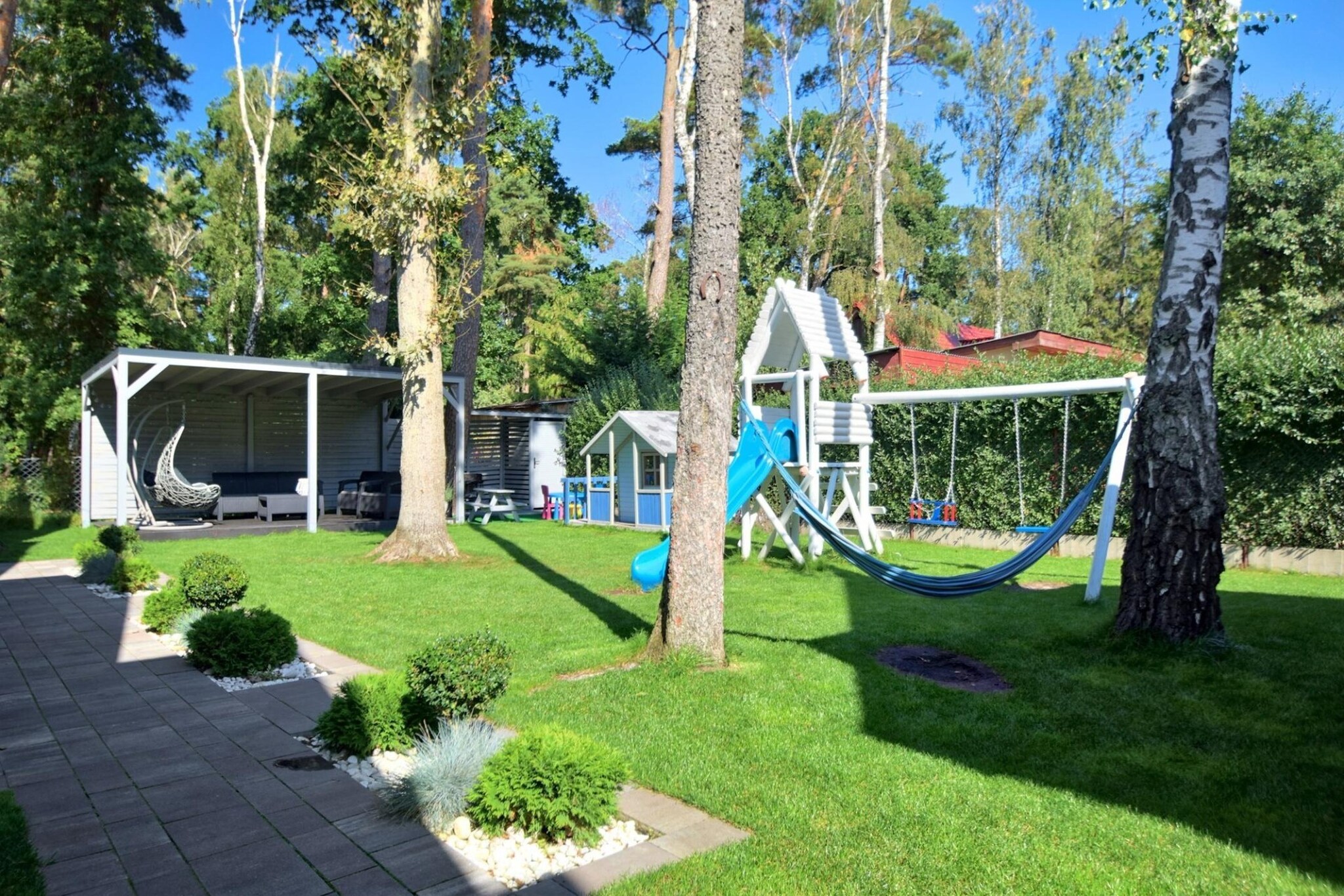 Piętrowe domki wakacyjne 2 plus 2 Pobierowo - Tuinen zomer