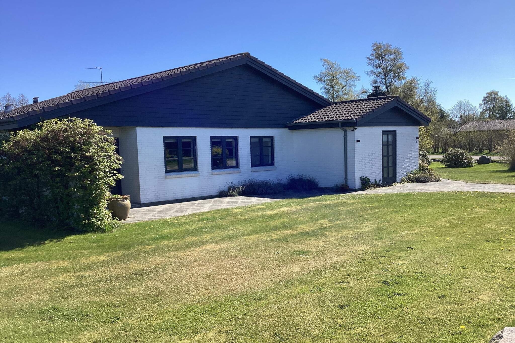 4 sterren vakantie huis in Væggerløse - Buitenlucht