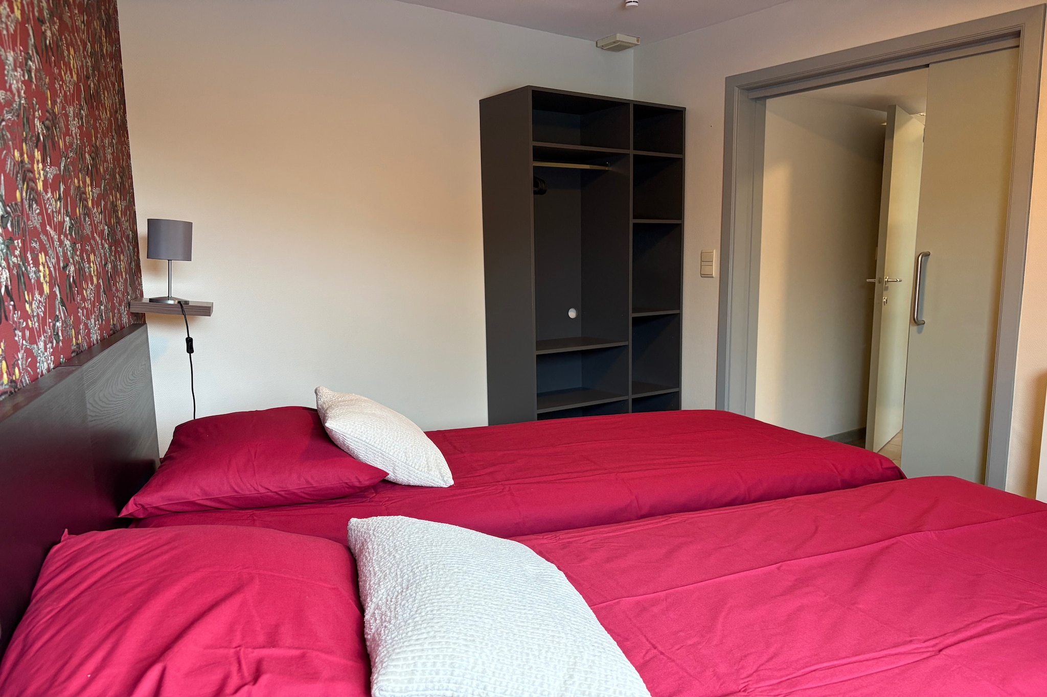 De Wachtkamer - Schlafzimmer