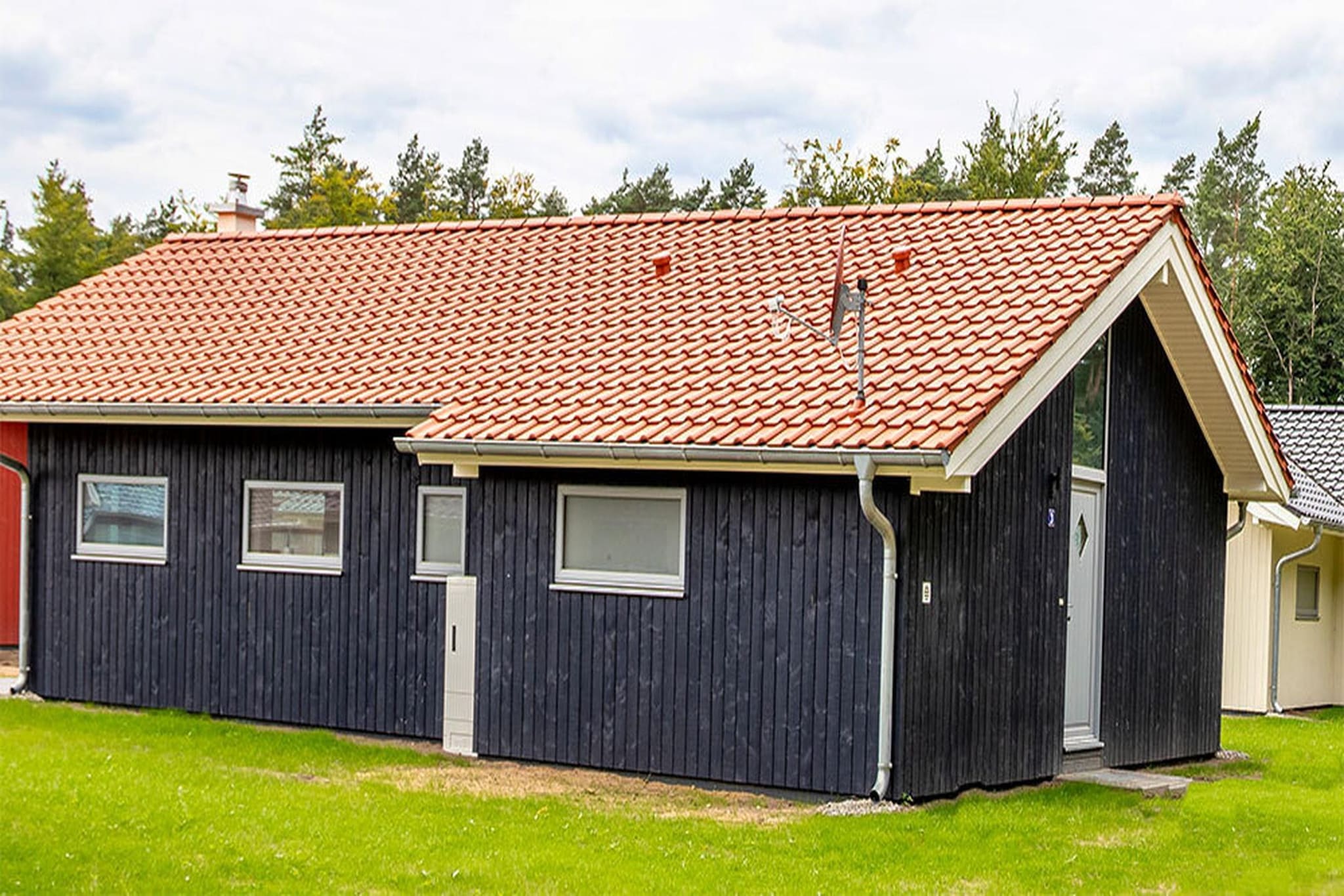 Ferienhaus A - Buitenkant zomer