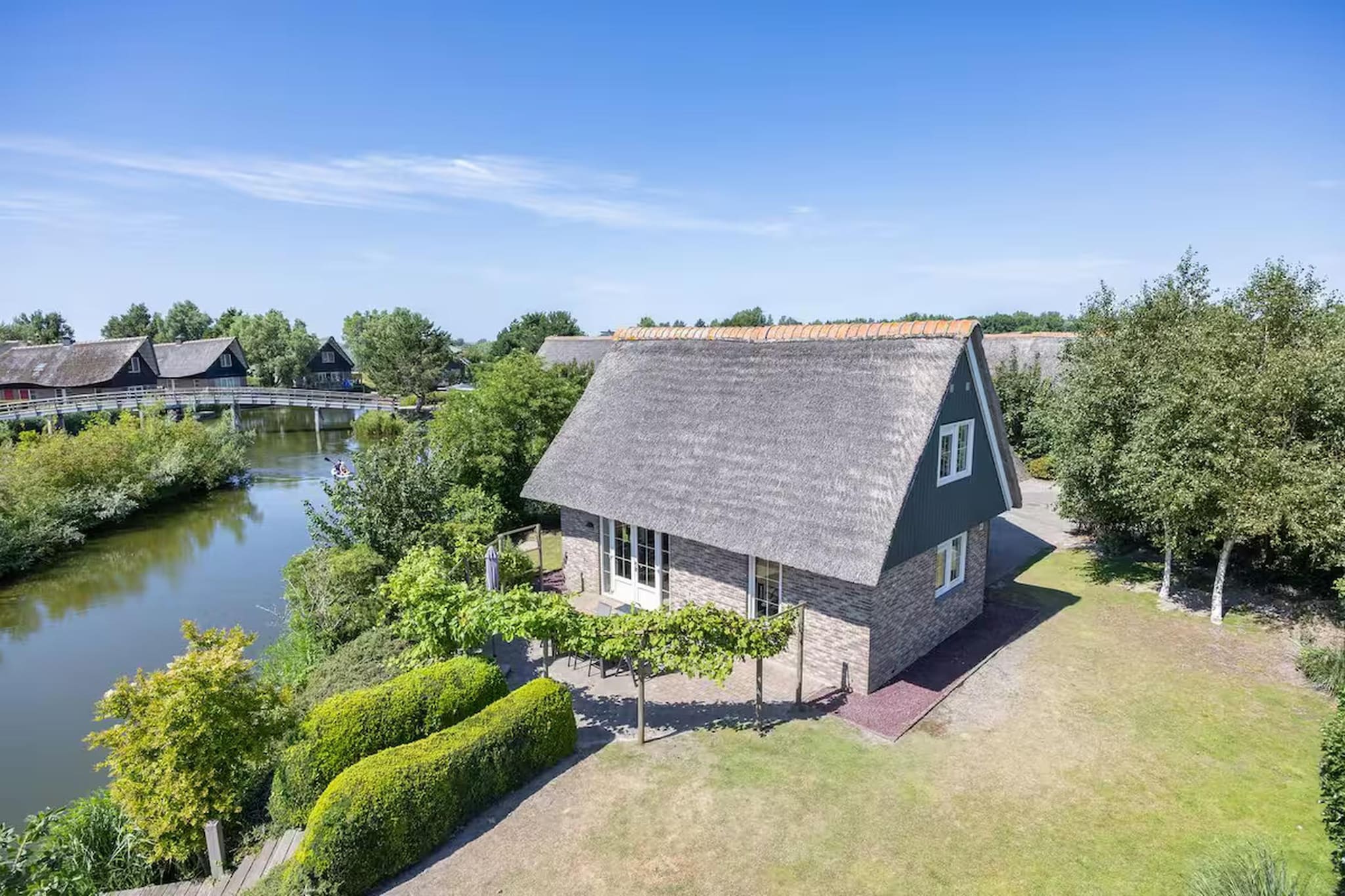 Villa in Makkum - 2 PAX - Außenbereich Sommer